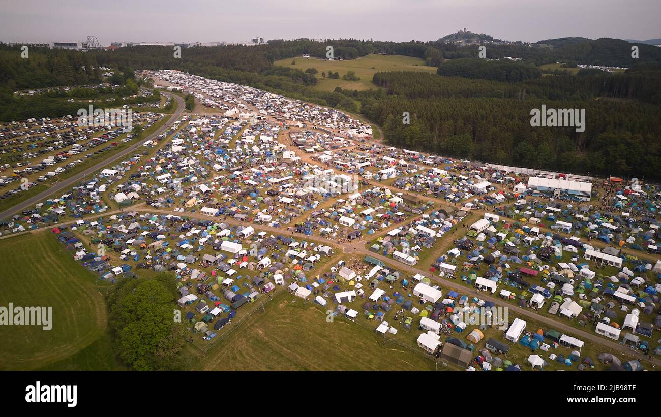 Nurburg, Germany. 04th June, 2022. 04 June 2022, Rhineland-Palatinate,  Nrburg: Many festival-goers of the open-air rock festival "Rock am Ring"  camp out on huge camping areas around the Eifel race track (aerial
