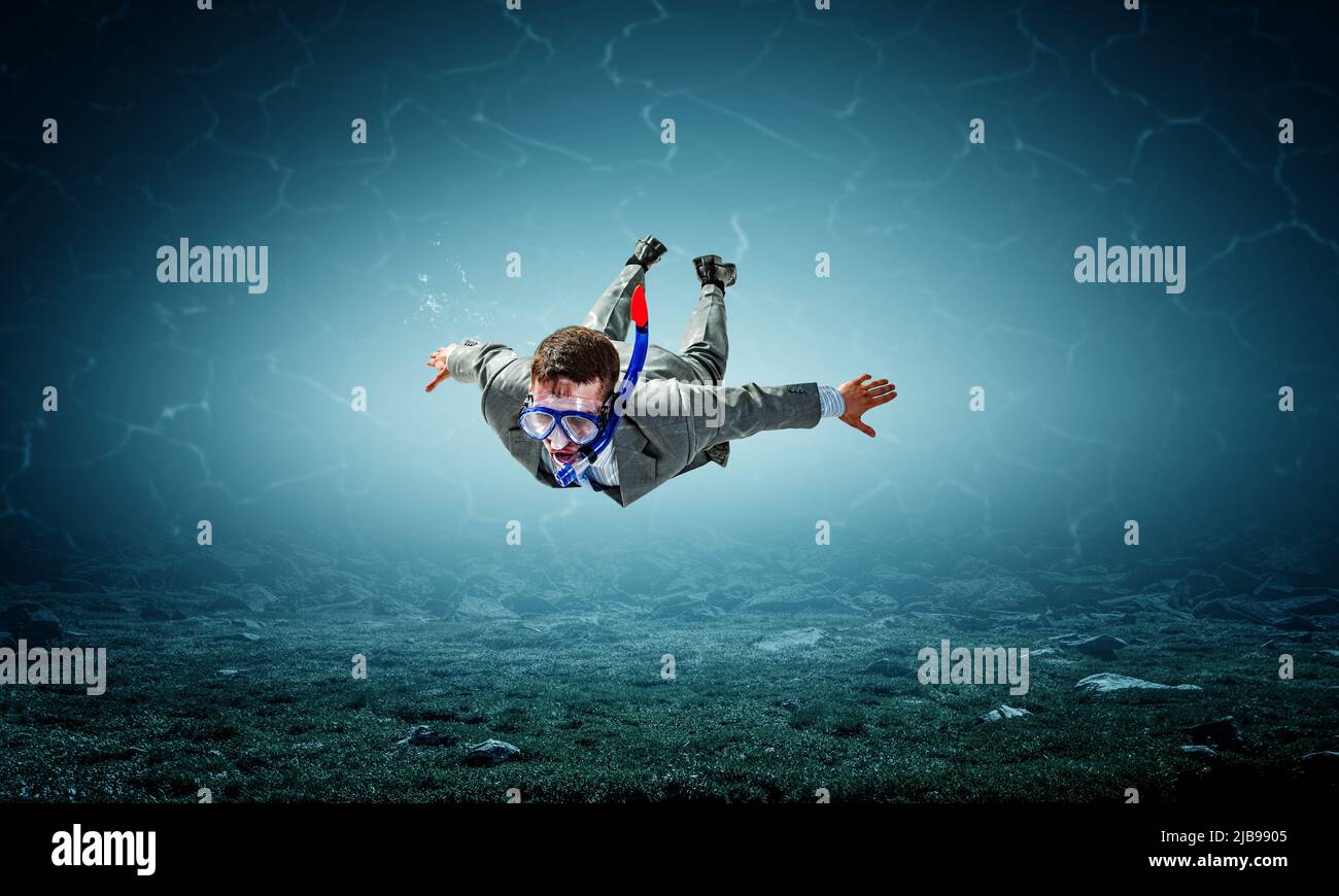 Swimming business suit hi-res stock photography and images - Alamy