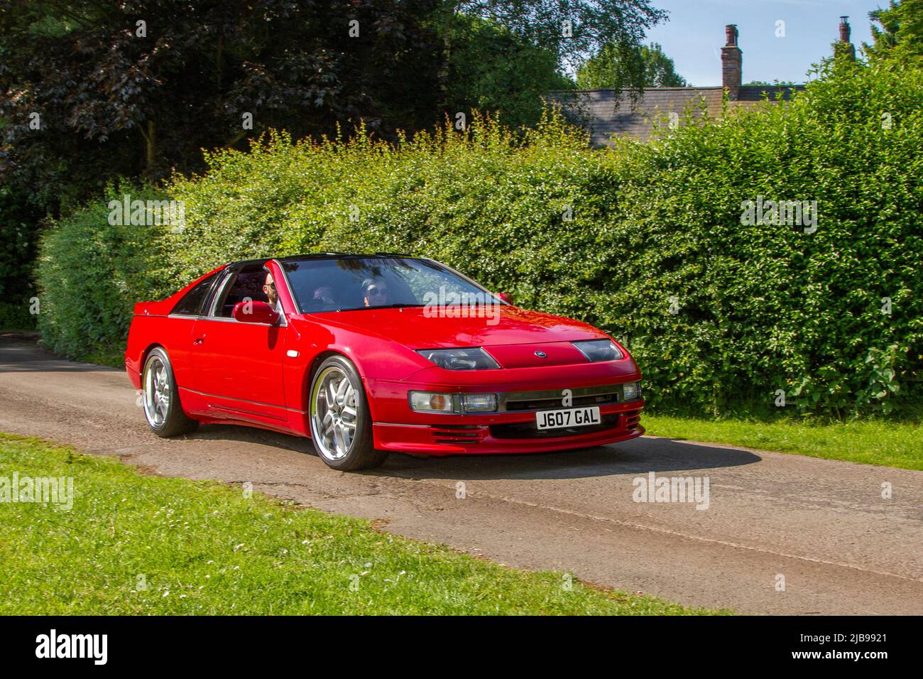 1992 90s nineties red Nissan 300 ZX 3000cc petrol cabriolet arriving in Worden Park Motor Village for the Leyland Festival, UK Stock Photo