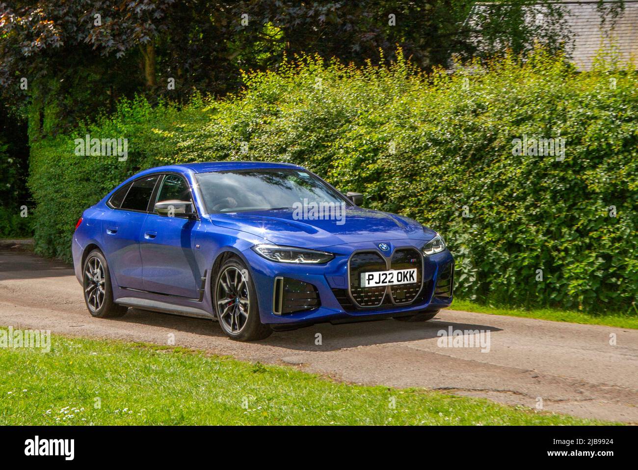 2022 blue BMW i4 M50 Electricity arriving in Worden Park Motor Village for the Leyland Festival, UK Stock Photo