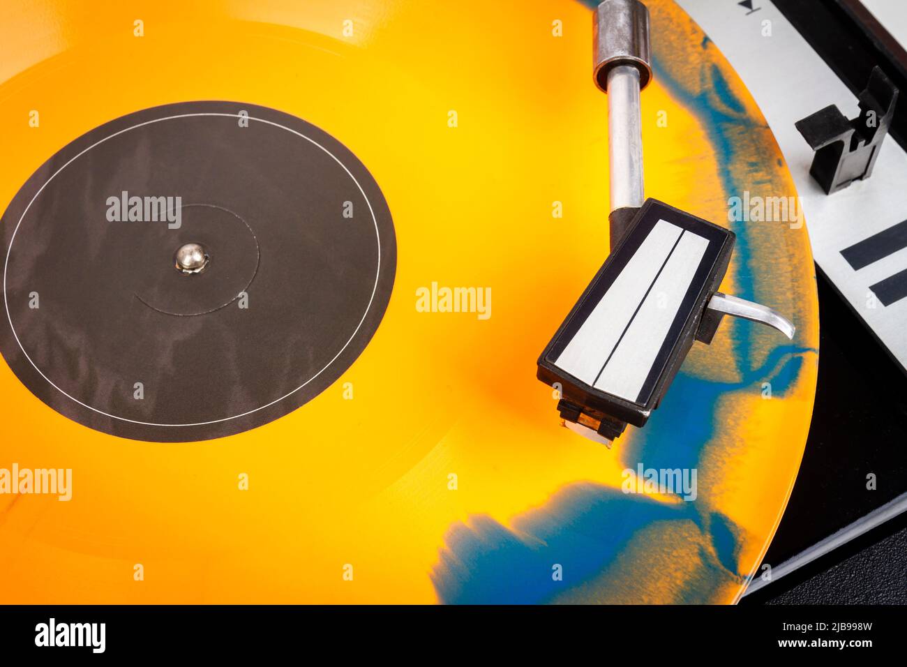 Close up of turntable needle on a vinyl record. Turntable playing vinyl