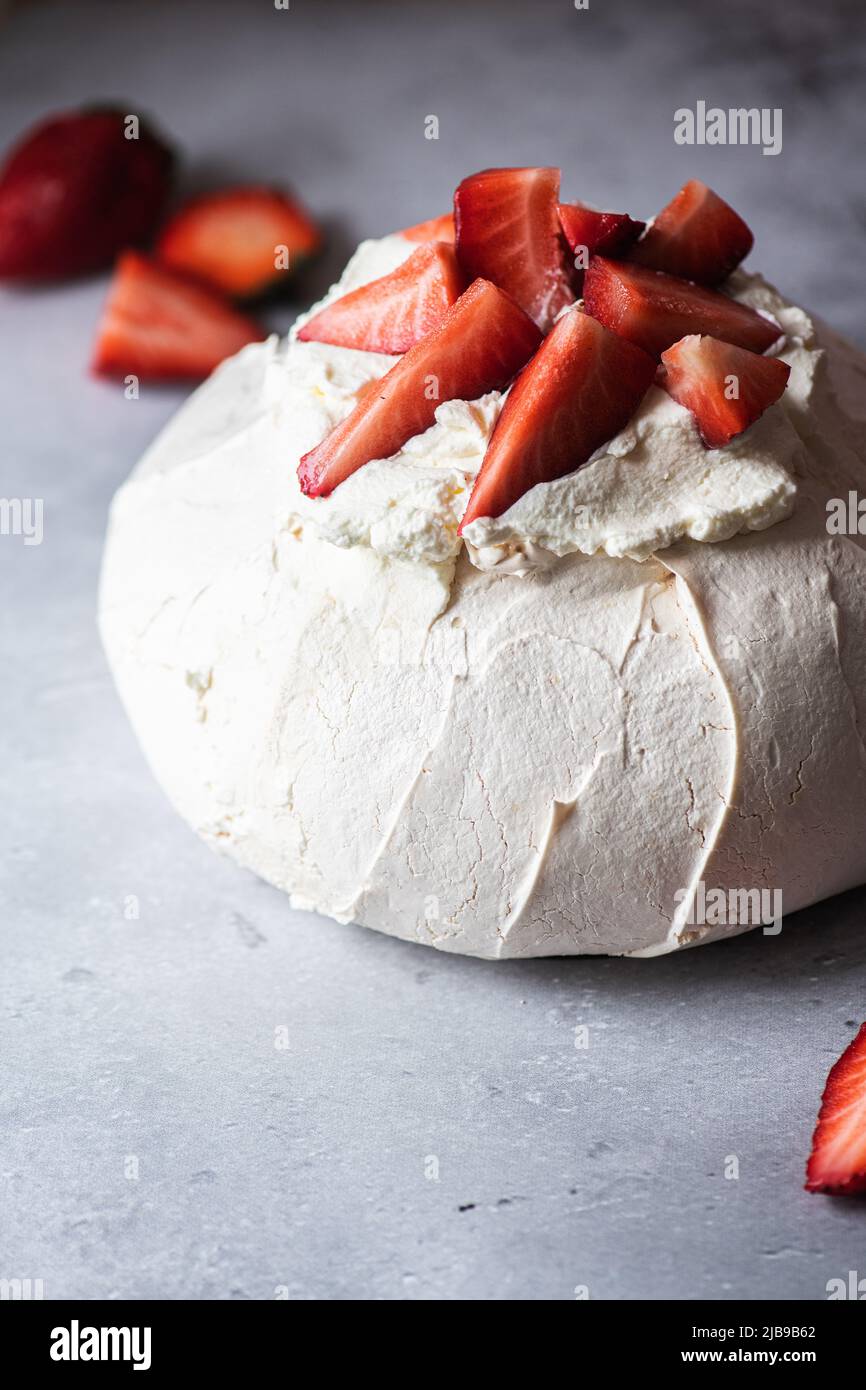 Summer fruit pavlova famous Australian dessert from baked whipped egg
