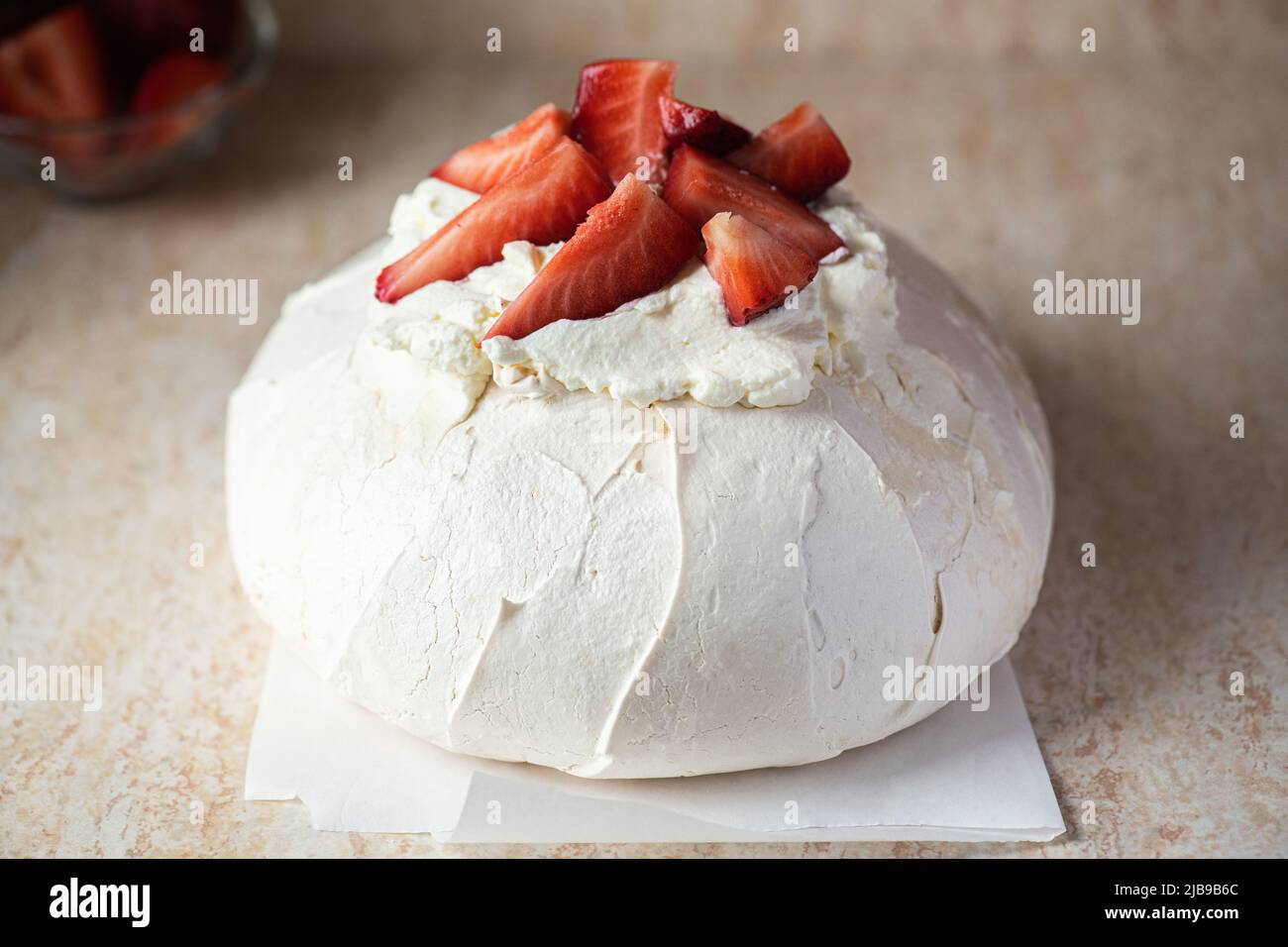 Pavlova - Famous Australian dessert with strawberries. Close up. Stock Photo