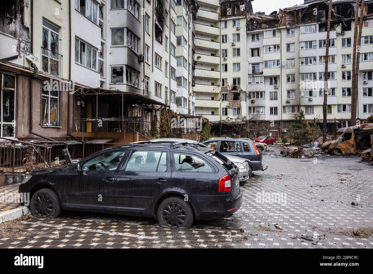 Shot cars. On the streets of Irpin. Cities of Ukraine after the Russian occupation. Irpin, Bucha, Hostomel. Stock Photo