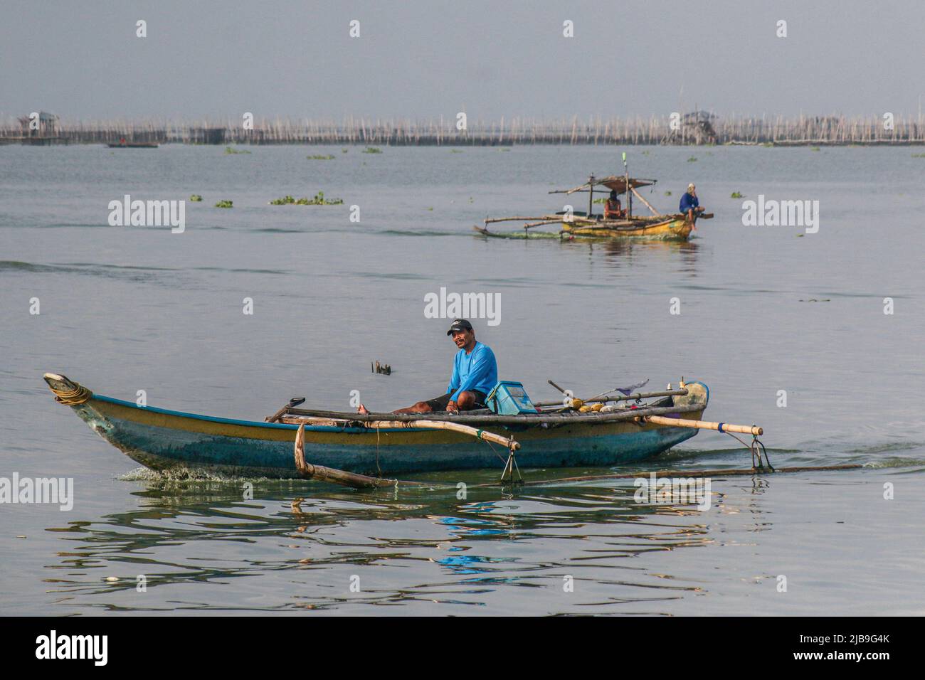 Binangonan, Philippines. 04th June, 2022. Several boats are seen rowing in the lake. Laguna Lake is the largest lake in the Philippines, covering a surface of 900 square kilometers or equivalent to 90,000 hectares. Its water runs from Laguna Province all the way to the Province of Rizal, the southern part of Luzon. The lake provides resources like transportation, recreation, livelihood, and most importantly food for the surrounding communities. Laguna Lake is classified as Class C freshwater which has the capability to grow fish and other aquatic resources. Some watershed near Metro Manila cla Stock Photo