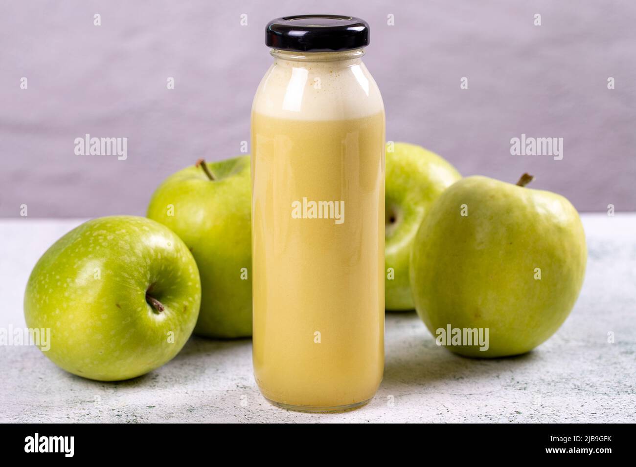 Apple juice. Freshly squeezed juice. Freshly squeezed apple juice in