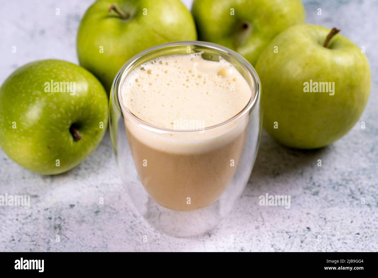 Apple juice. Freshly squeezed juice. Freshly squeezed apple juice in