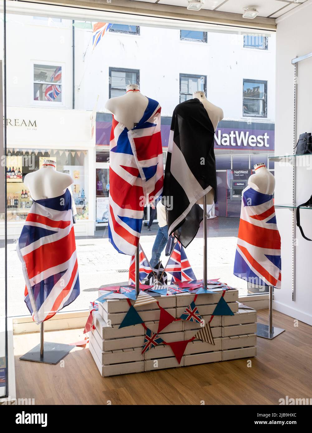 Colourful shop window display commemorating the Platinum Jubilee of