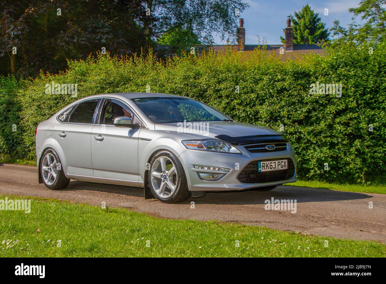 2013 Silver Ford Mondeo 1997cc Diesel 6 Speed H arriving in Worden Park Motor Village for the Leyland Festival, UK Stock Photo