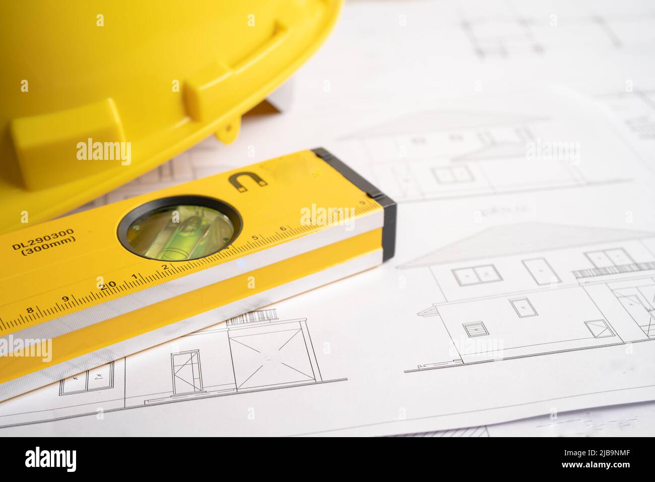 Architectural House Plan Project Blueprint With Yellow Helmet And ...