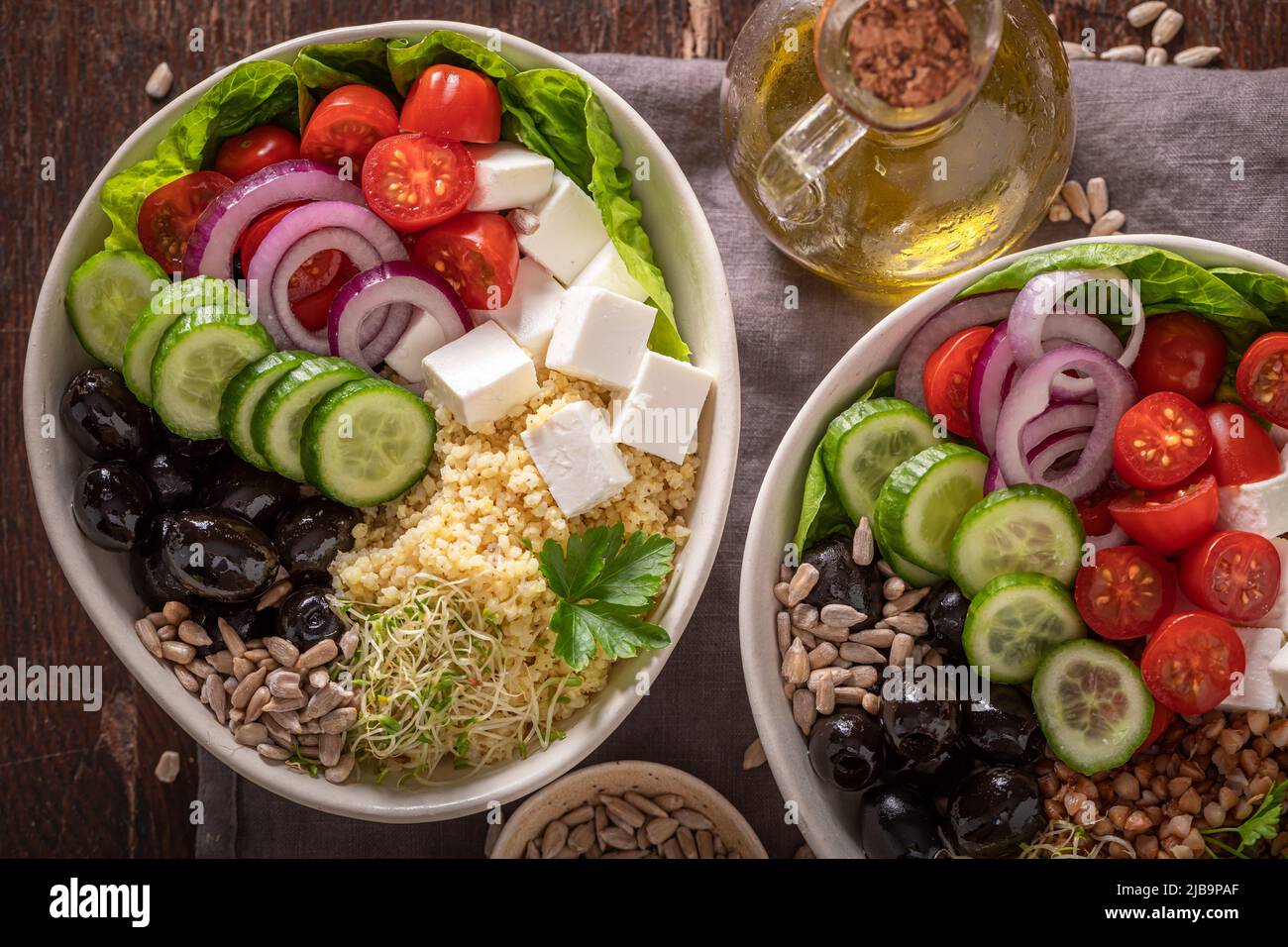 Fresh Greek salad with groats, feta cheese and vegetables. Nutritious