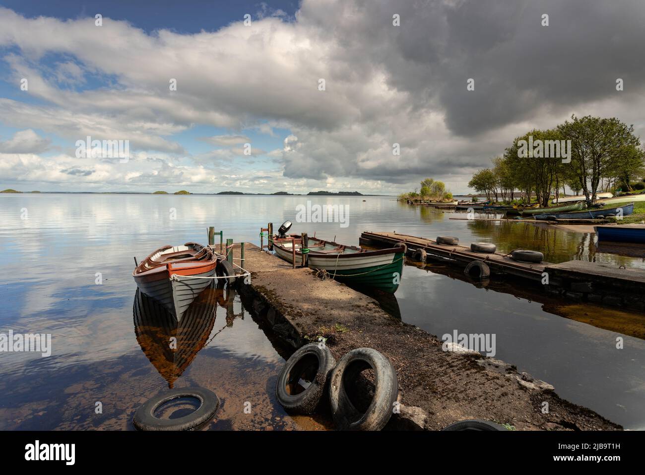 Small boats moored at Lough Corrib, County Galway, Ireland Stock Photo