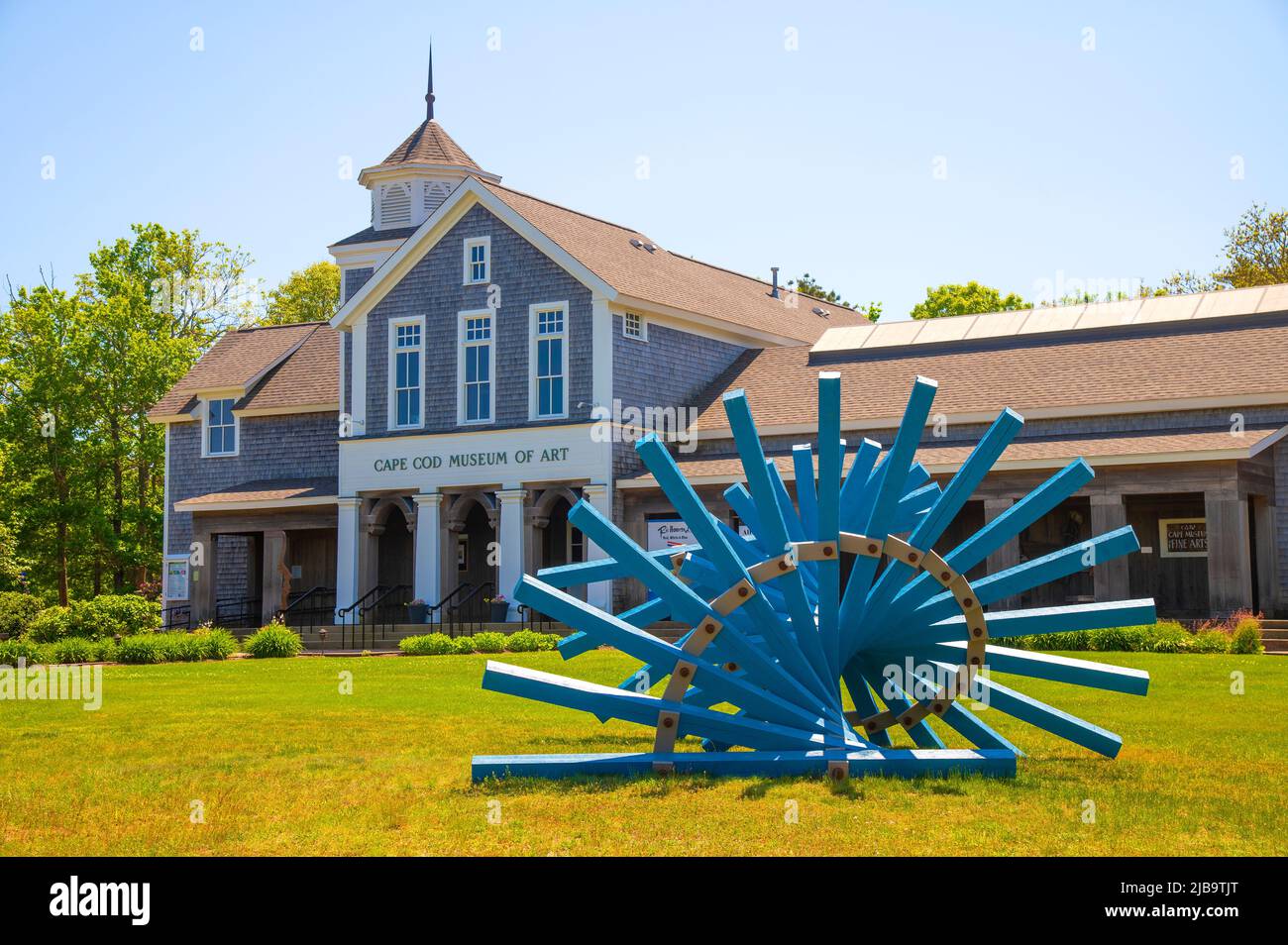 Cape Cod Museum of Fine Art with a wooden sculpture in front.  Dennis, Massachusetts on Cape Cod, USA Stock Photo