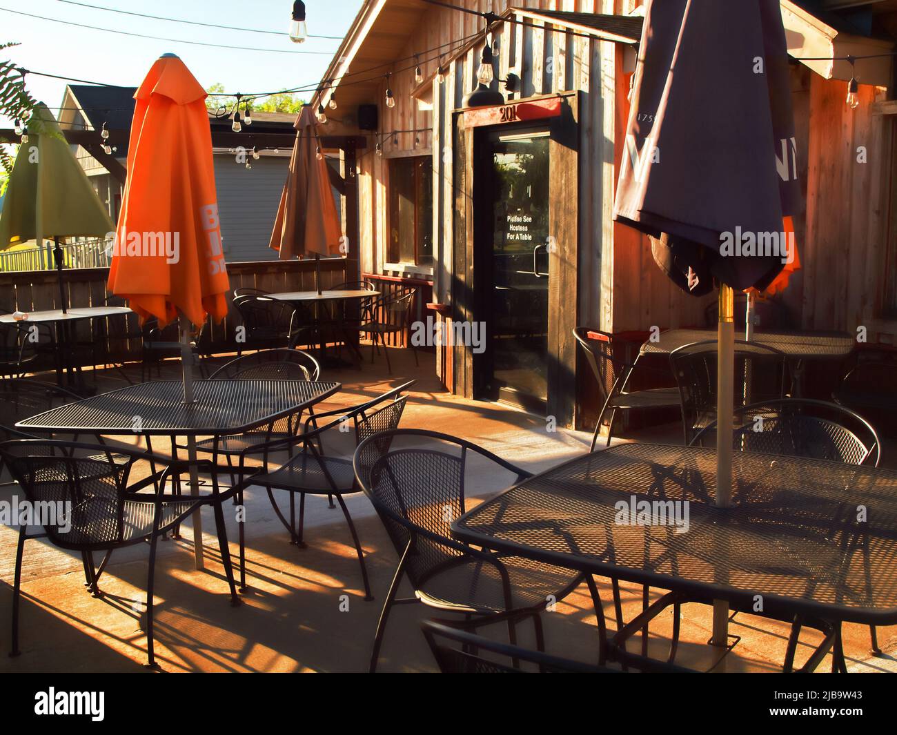 Liverpool, New York, USA. June 4, 2022. Outdoor patio of The Limp Lizard Bar and Grill in the village of Liverpool, New York Stock Photo