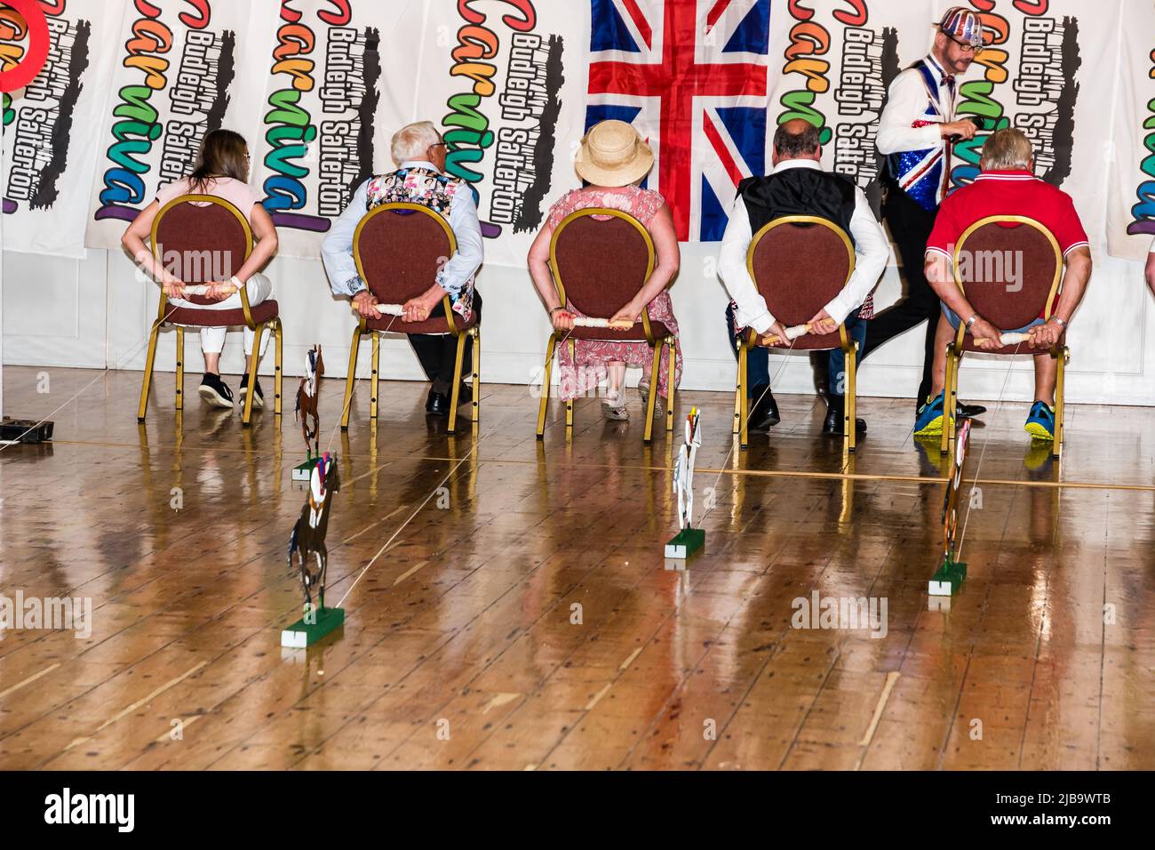 Jubilee Racing Night in Budleigh Public Hall.  The final furlong. Stock Photo