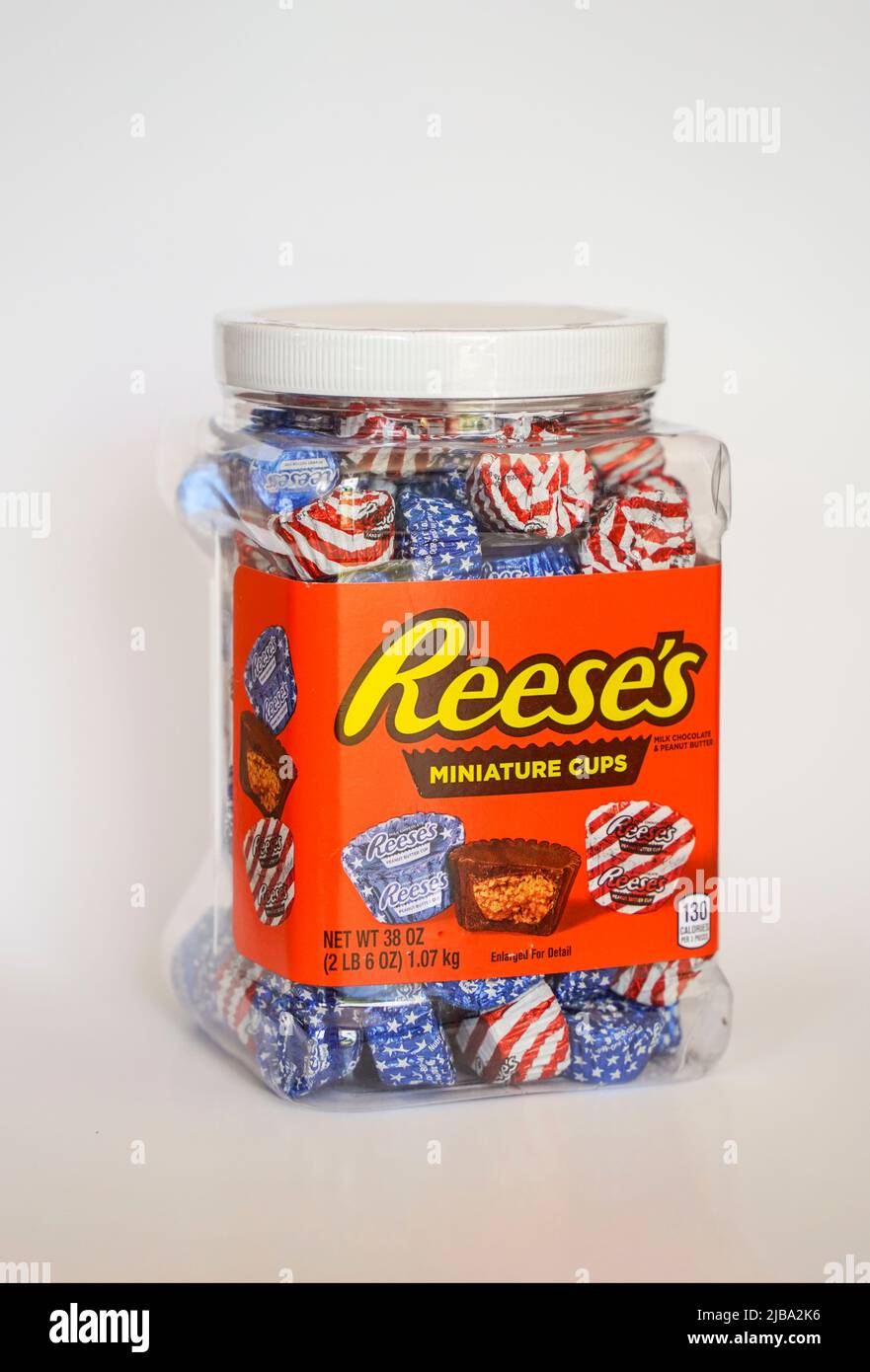 Reese's miniature cups, special edition American flag, Reeses peanut butter cups in a plastic container. Stock Photo