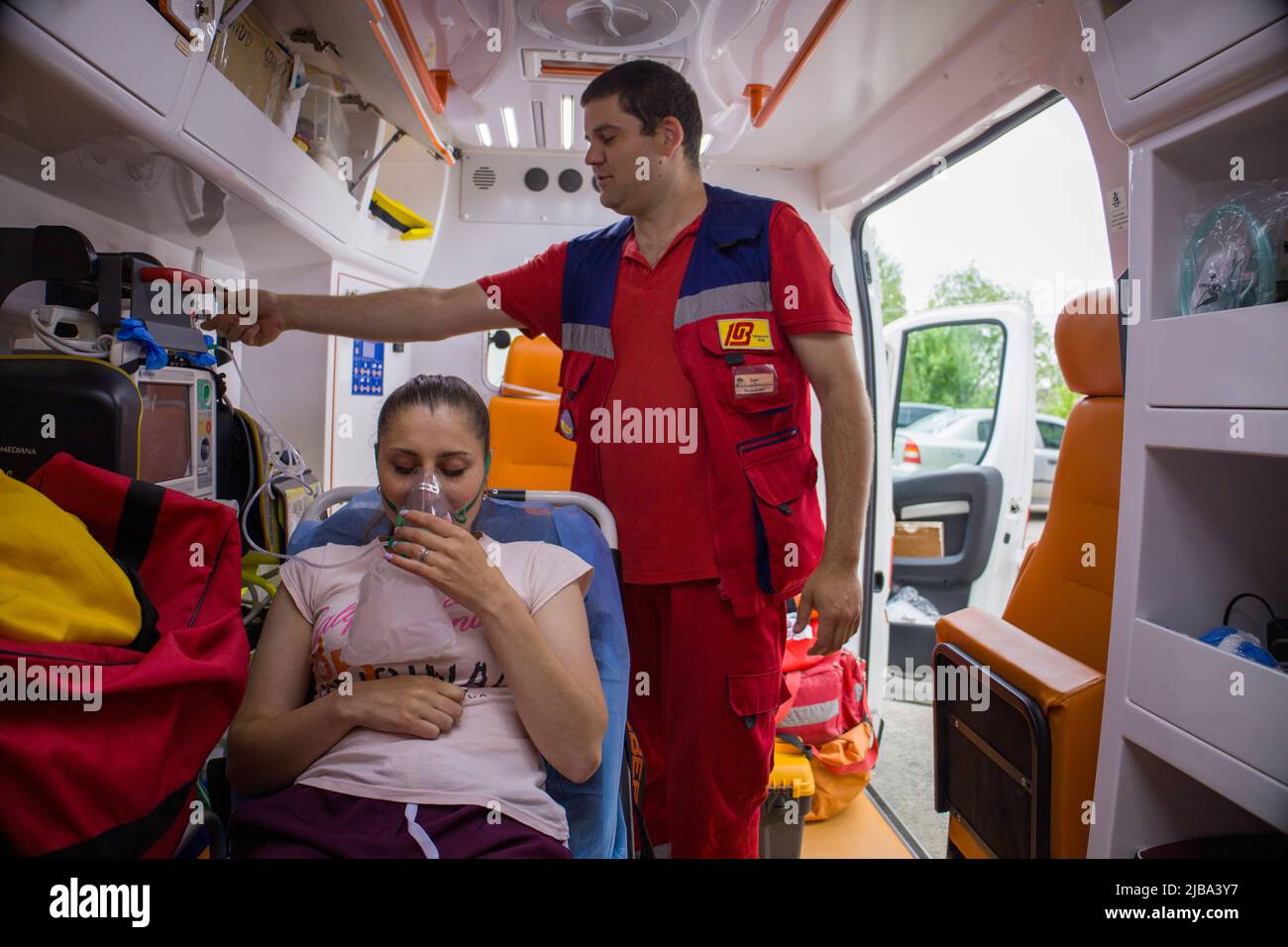 Kyiv. Ukraine. 2.06.2022. An ambulance paramedic treats the girl Stock Photo