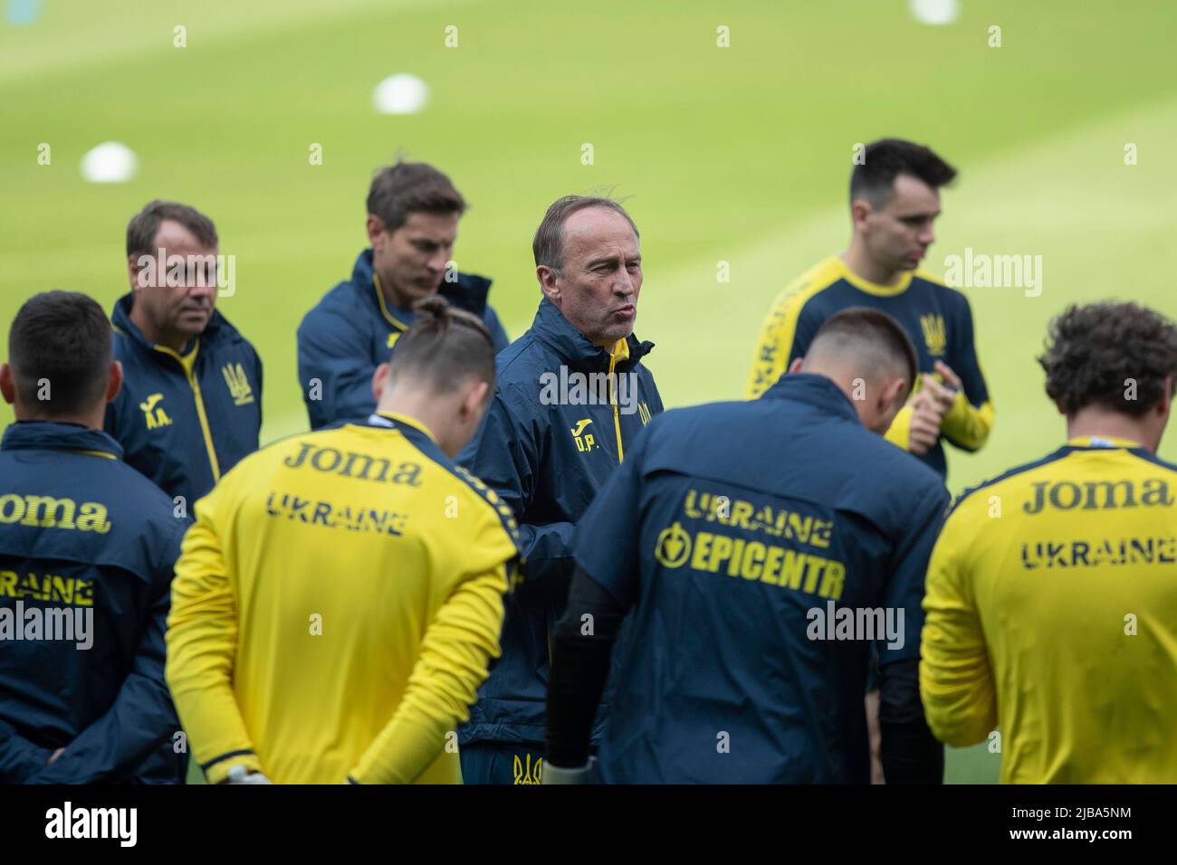 Cardiff, Wales, UK. 4th June, 2022. Head coach Oleksandr Petrakov addresses his players before Ukraine national football team training at the Cardiff City Stadium ahead of the FIFA World Cup play-off final match against Wales. Credit: Mark Hawkins/Alamy Live News Stock Photo