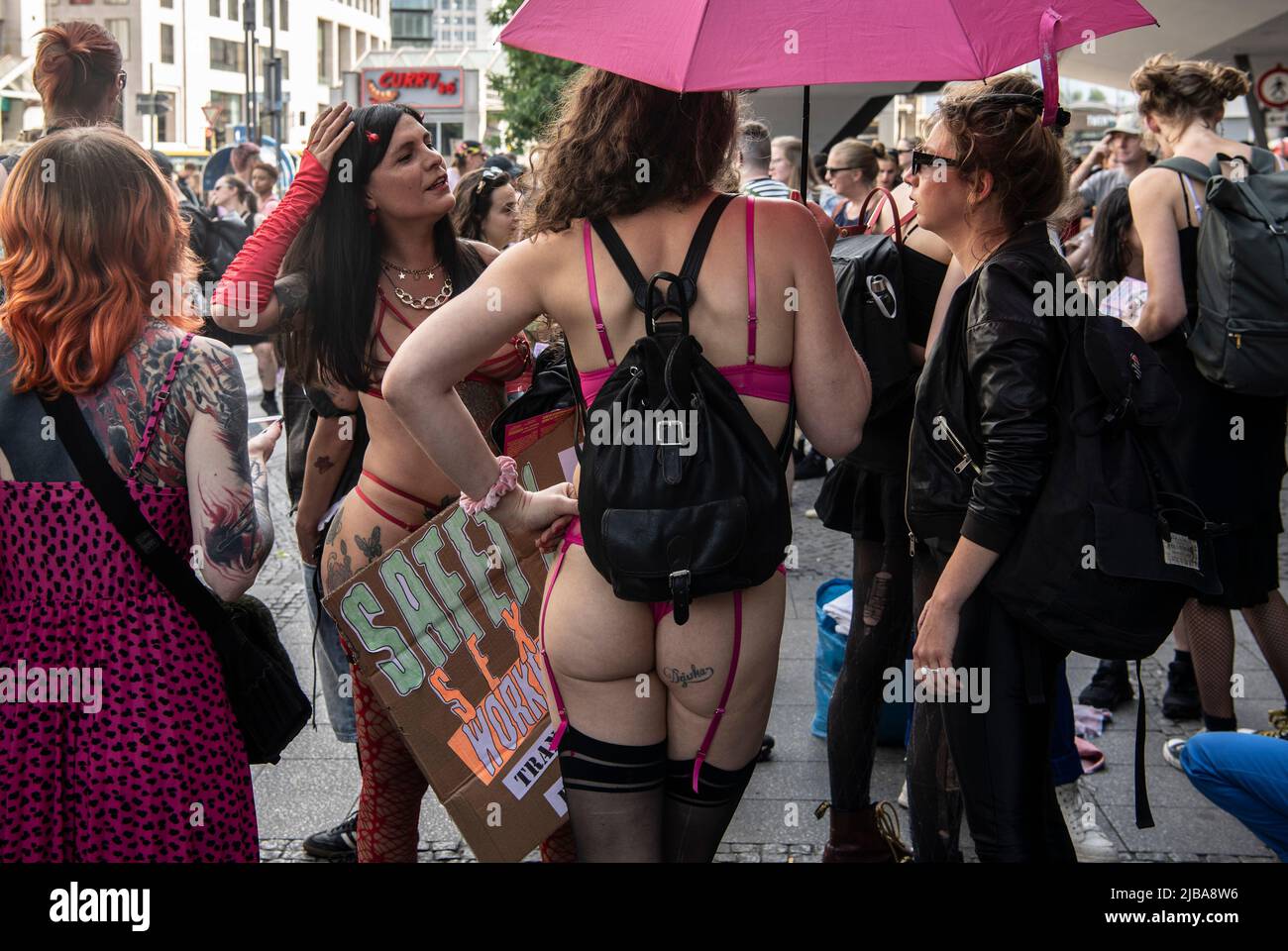 Berlin, Germany. 04th June, 2022. Participants of the demonstration on the  occasion of World Whores' Day stand together at Hardenbergplatz. Many  prostitutes want to get out of the dirty corner and be