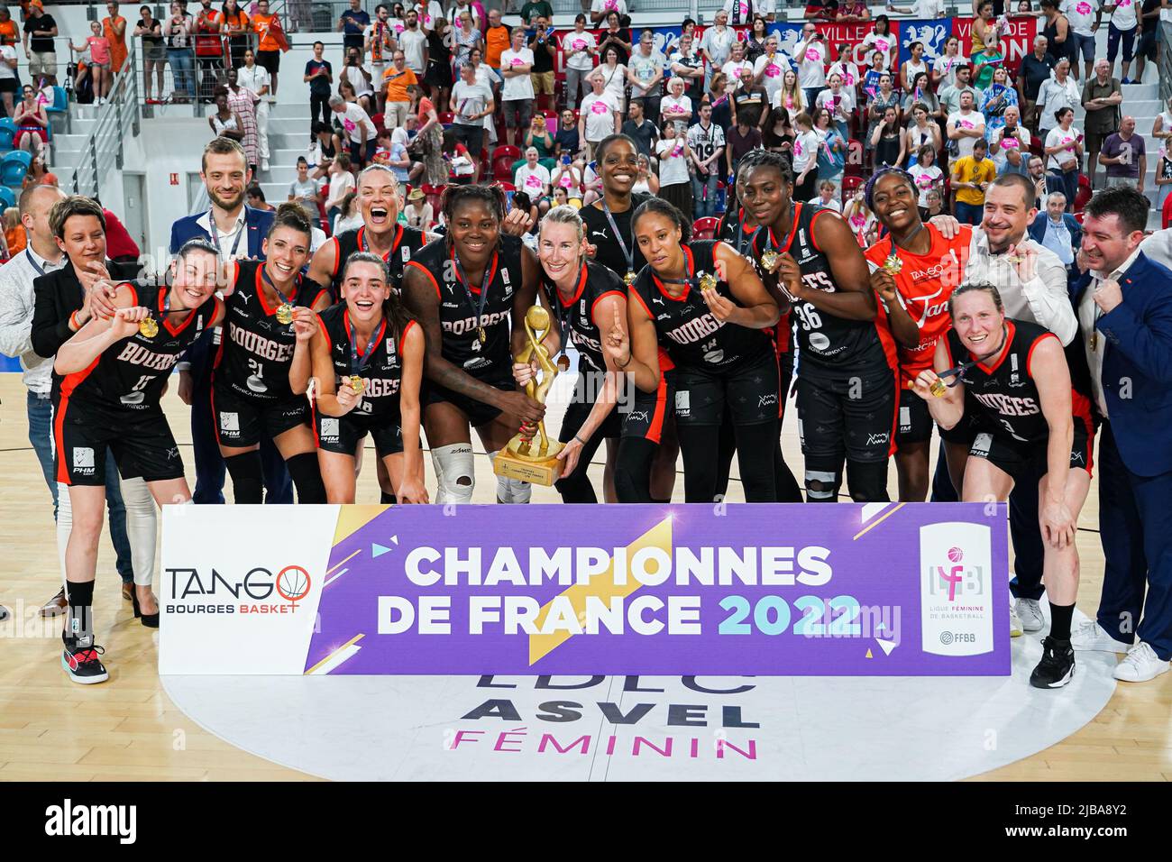 Lyon, France. 04th June, 2022. Players of Bourges lift the French Womens  basketball champion trophy after the LFB Play-offs final third match  between Lyon and Bourges at Mado Bonnet Arena in Lyon,