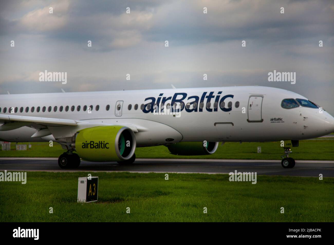 air baltic plane taking off from manchester airport Stock Photo