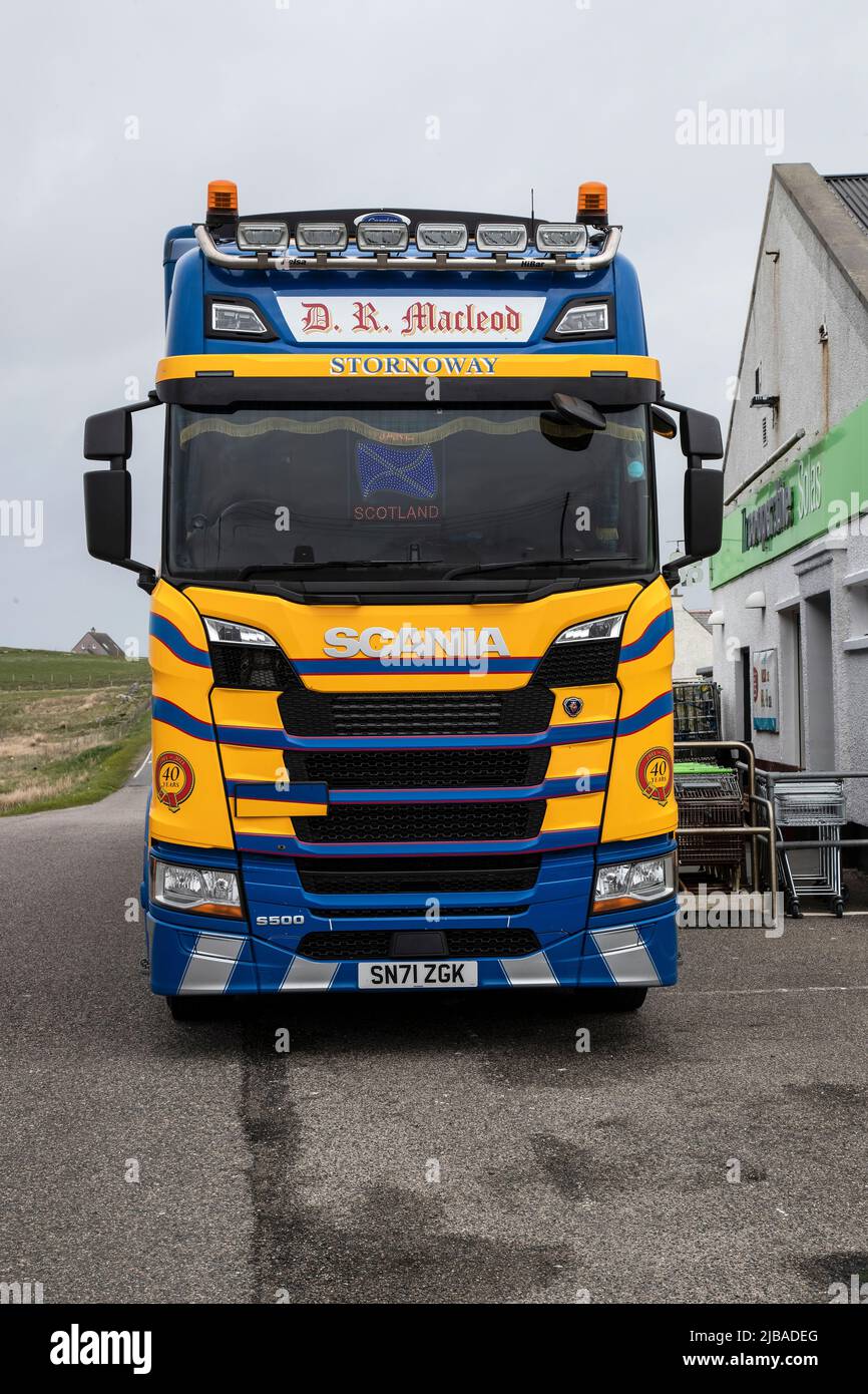 Heavy Goods Vehicle delivering goods and produce to an isolated Cooperative Retail store at Sollas Coop on North Uist, Outer Hebrides. Stock Photo