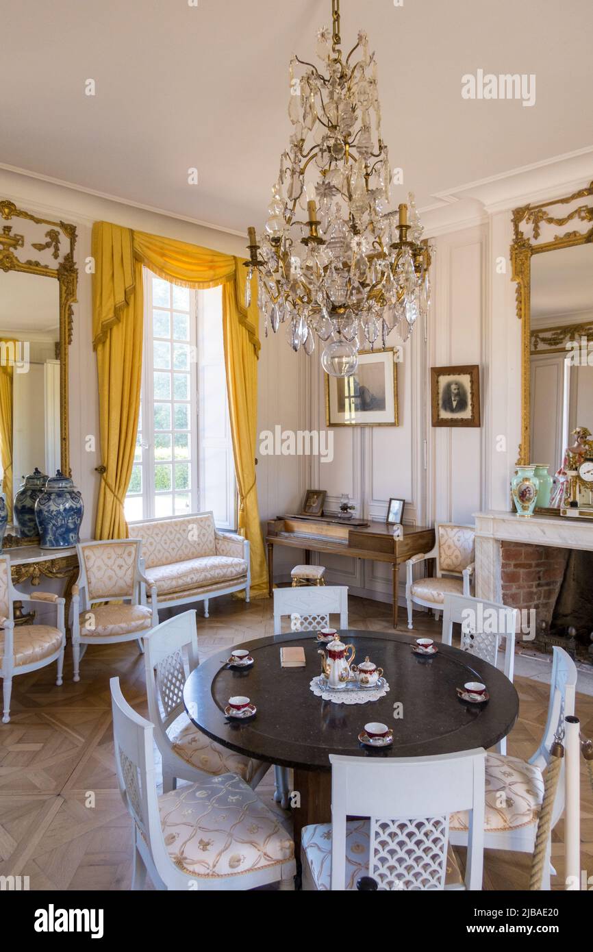 France, Normandy, Suisse Normande. Château de Pontécoulant. The Large Room set for tea. Furniture made by Dupain at the end of 18th century. Stock Photo