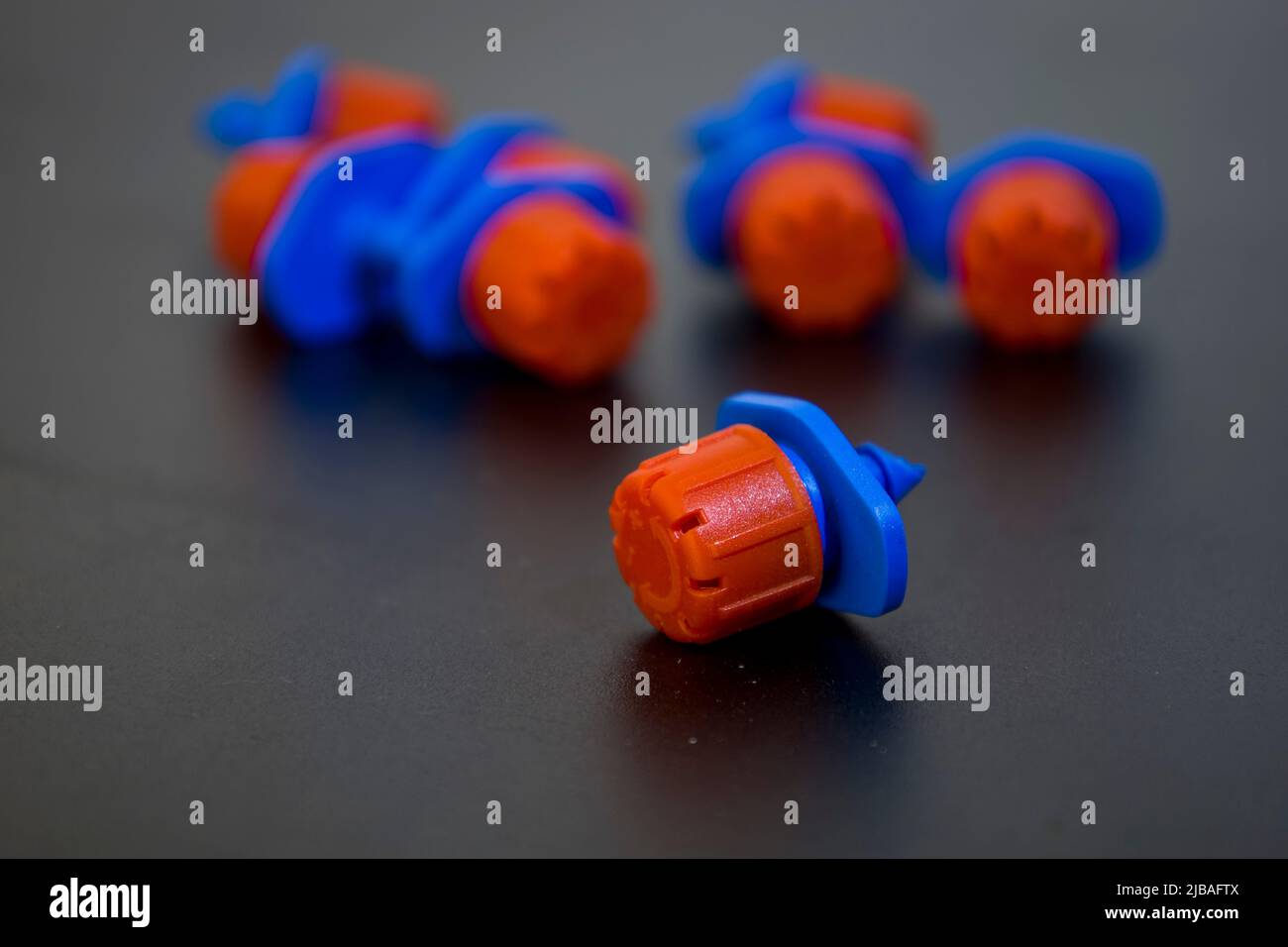 Nozzles for drip irrigation. Selective focus. Stock Photo