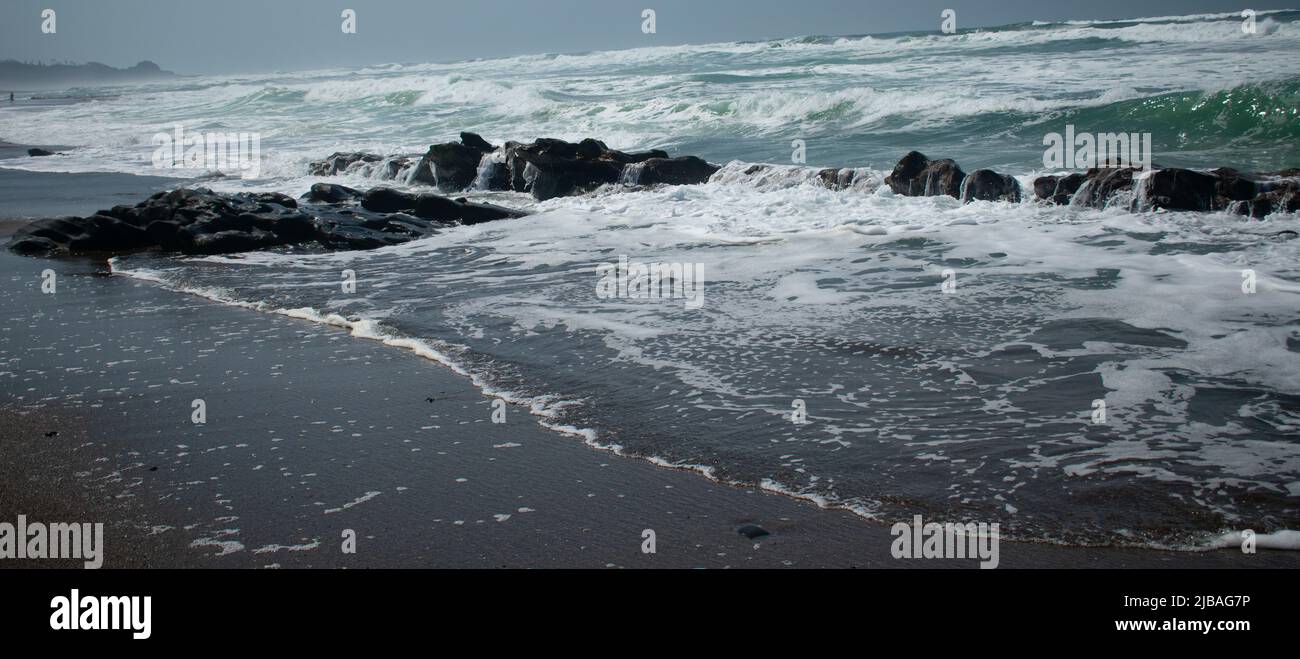 waves on rocks on the beach near salishan resort in portland oregon Stock Photo