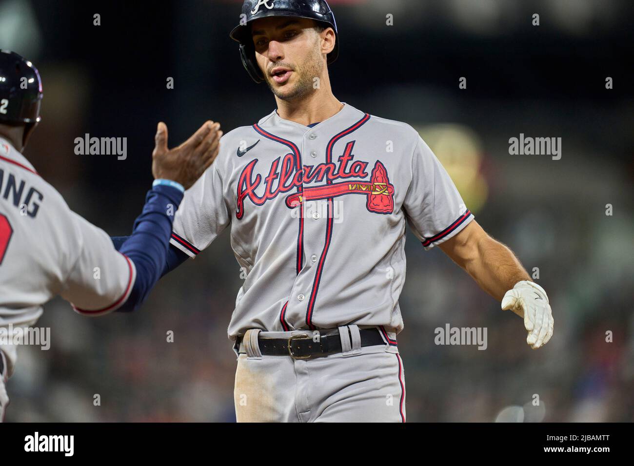 Denver CO, USA. 3rd June, 2022. Atlanta first baseman Matt Olsen (28)  drives in runs int he 10 th inning during the game with Atlanta Braves and  Colorado Rockies held at Coors