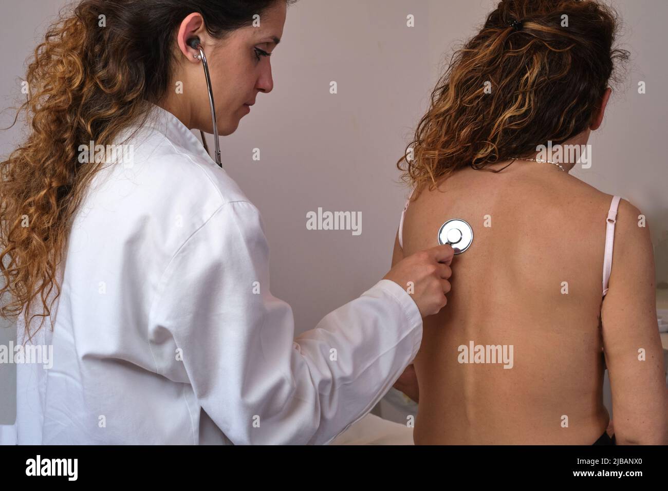 chest listening with stethoscope Stock Photo
