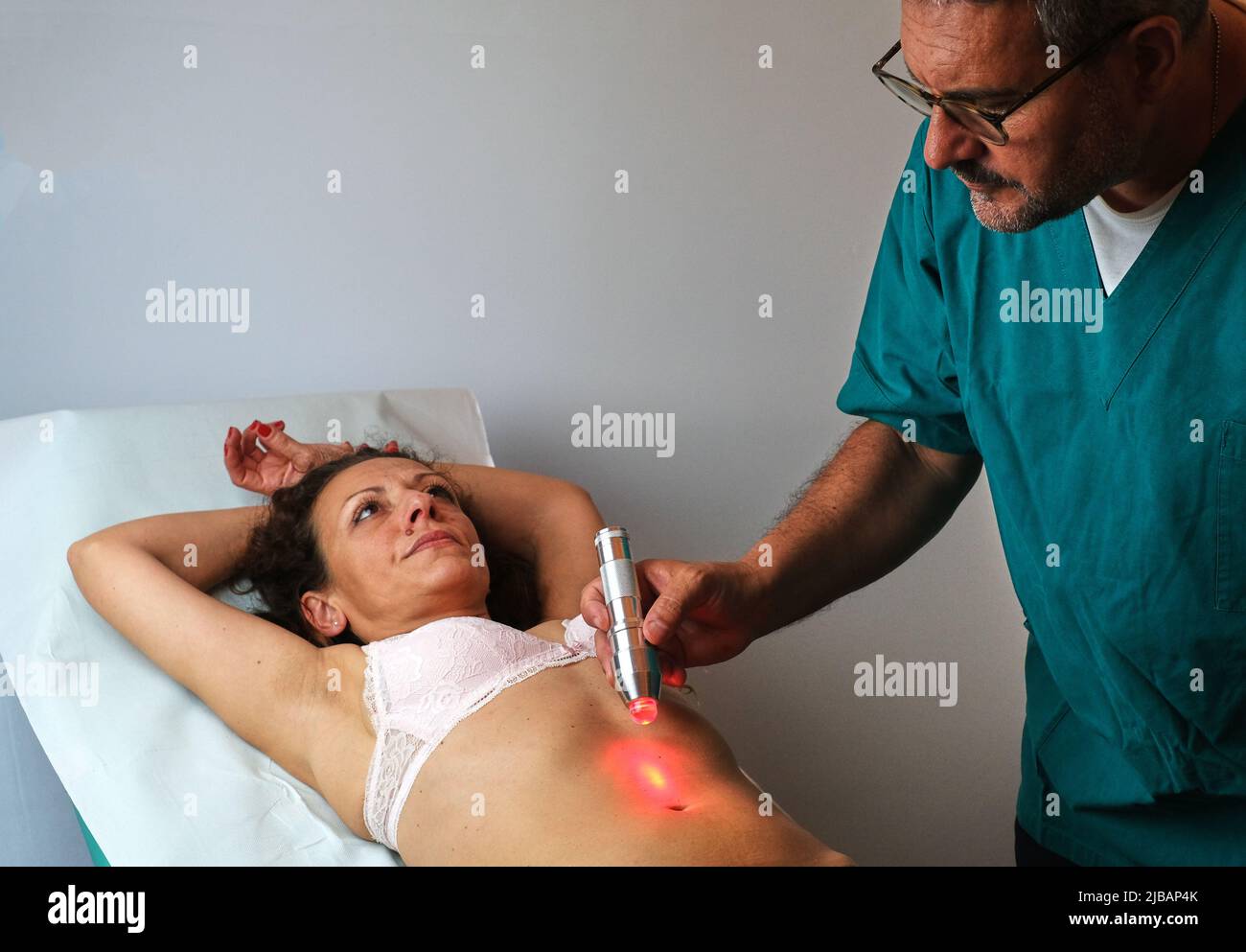 skin stimulation with electromagnetic frequencies Stock Photo