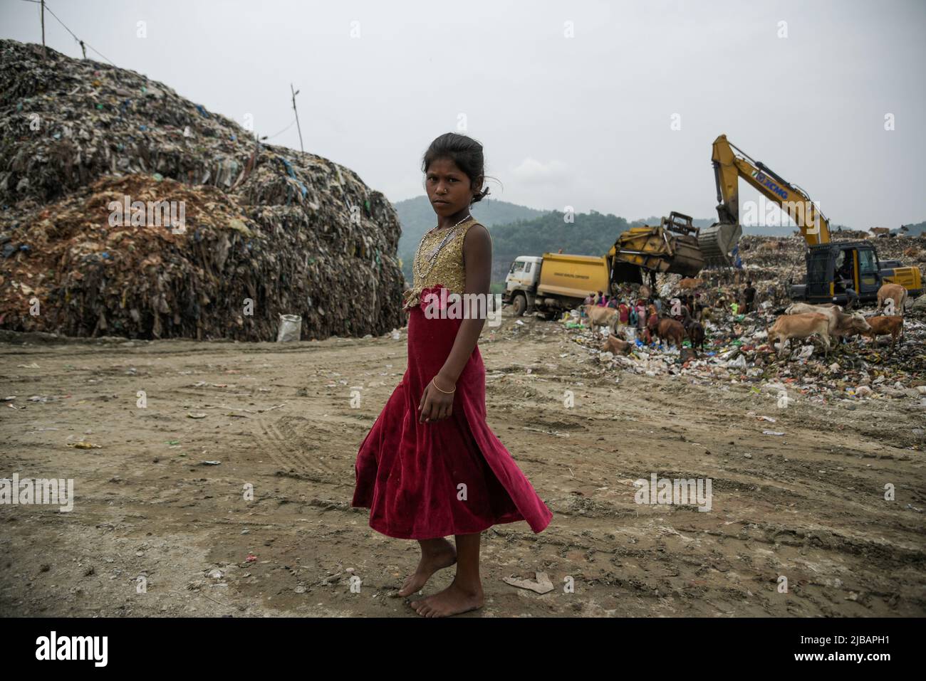 A girl rag picker at a garbage dumpsite, in Guwahati, Assam, India on 04 June 2022. World Environment Day 2022 is the biggest international day for the environment. Led by the United Nations Environment Programme (UNEP) on 05 June every year. Credit: David Talukdar/Alamy Live News Stock Photo