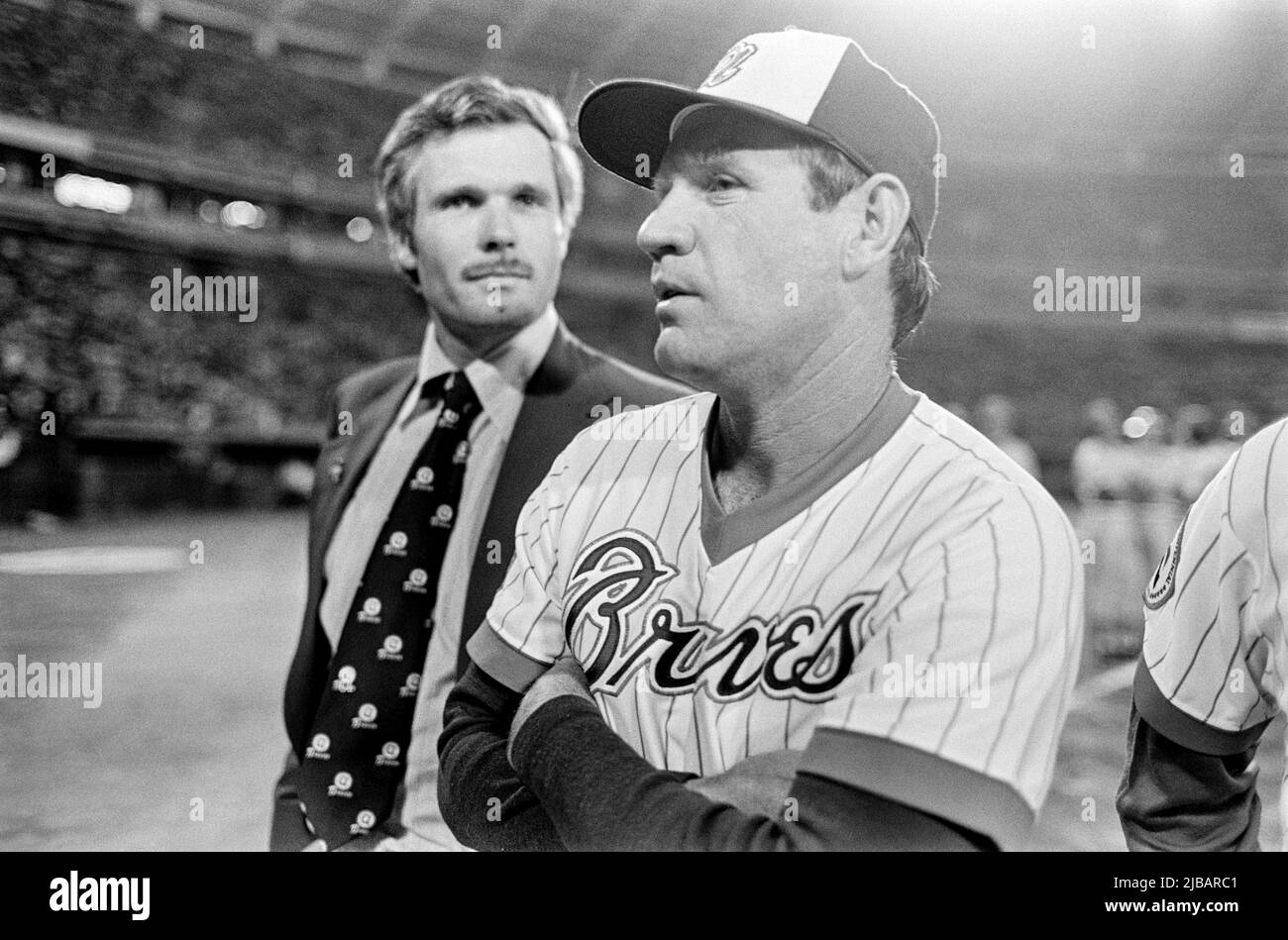 Wealthy cable television magnate and (later) CNN founder Ted Turner appears on the baseball field at Atlanta-Fulton County stadium with Atlanta Braves manager Dave Bristol after buying the Braves in 1976. Stock Photo