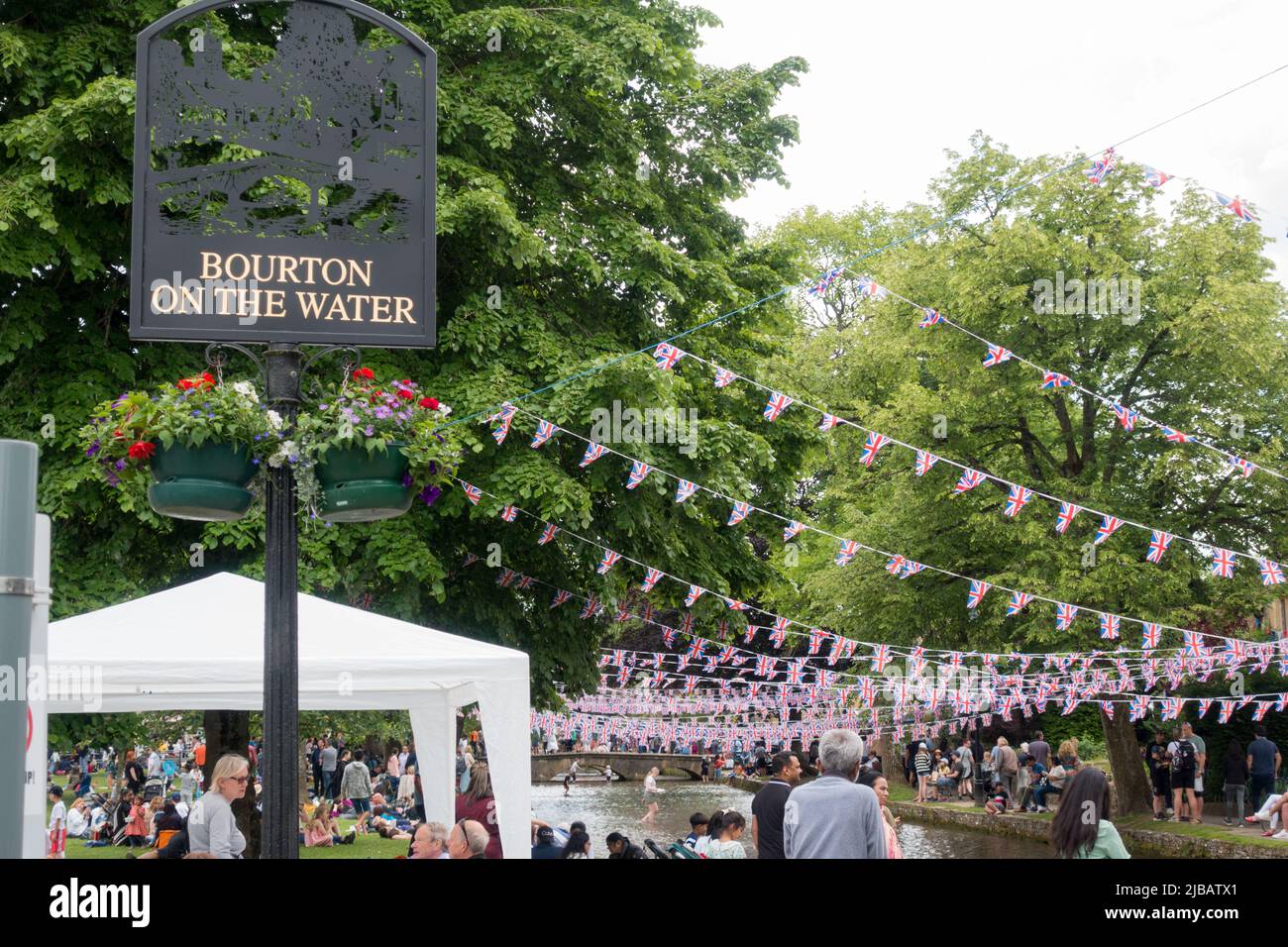 Cotswold English Idyllic village decorated with bunting for the Queen's