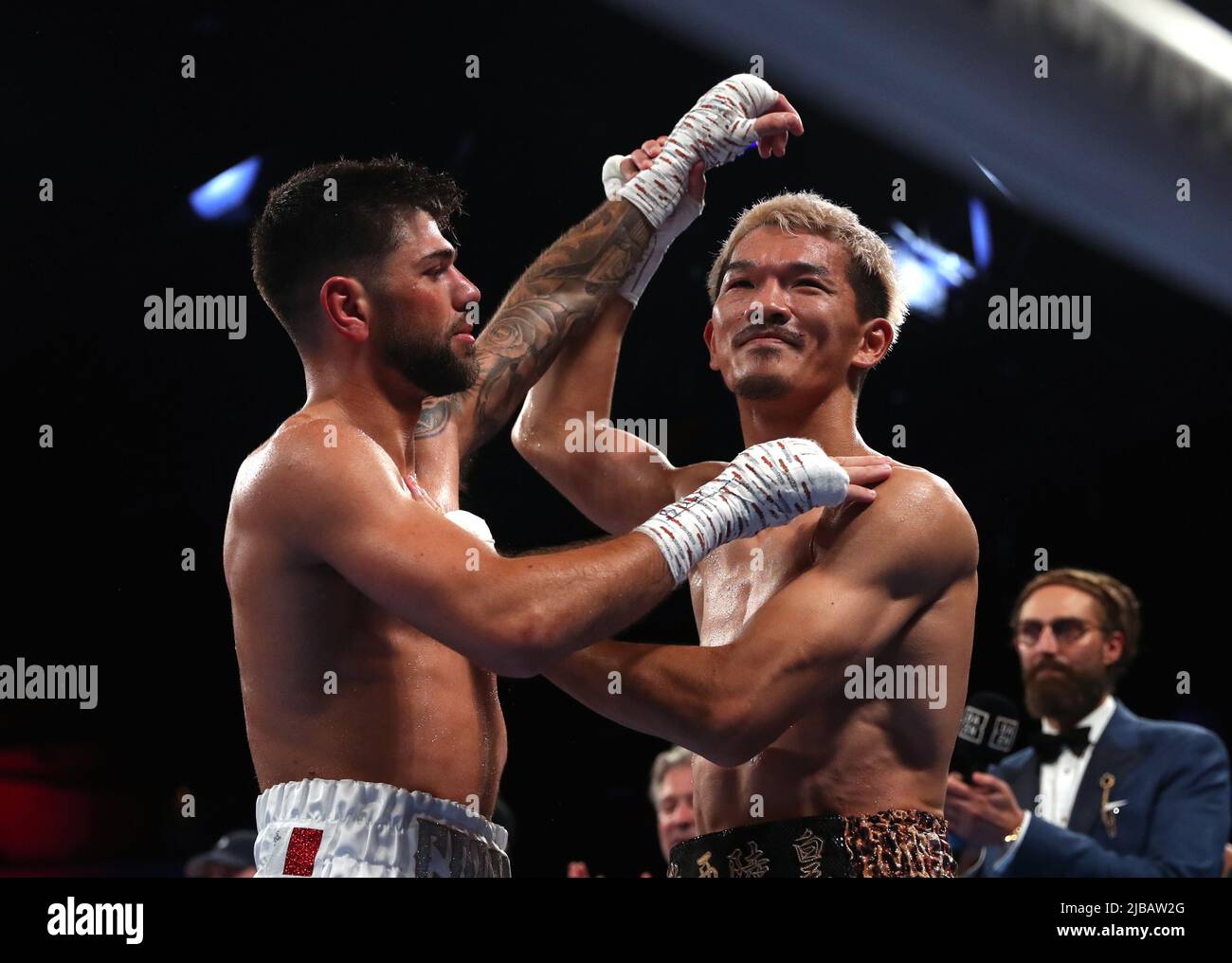 Joe Cordina (left) greets Kenichi Ogawa after the International Boxing Federation World Super Feather Title at the Motorpoint Arena Cardiff. Picture date: Saturday June 4, 2022. Stock Photo