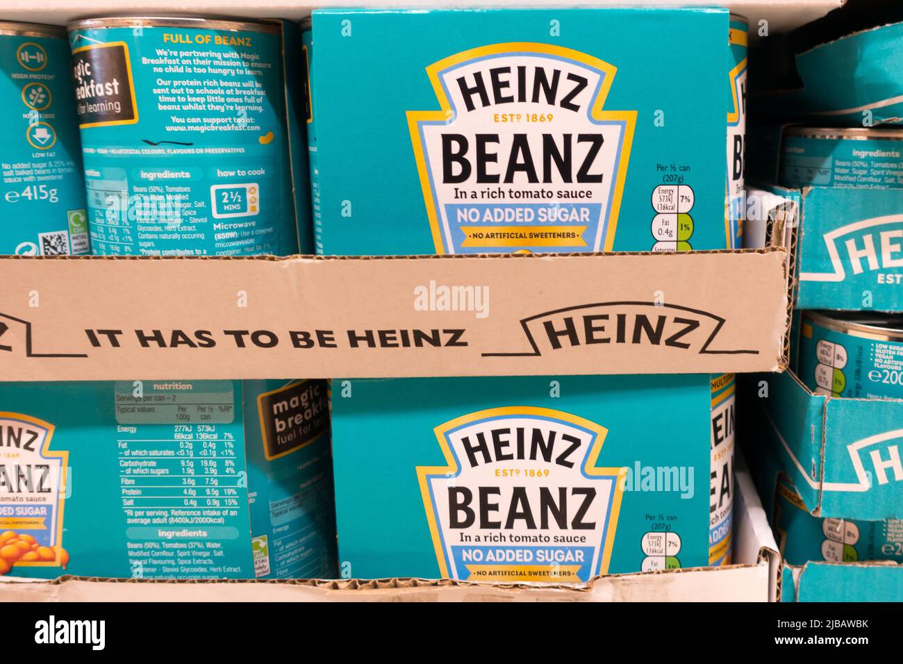 Heinz Beanz the breakfast beans tins in store shelf Stock Photo Alamy