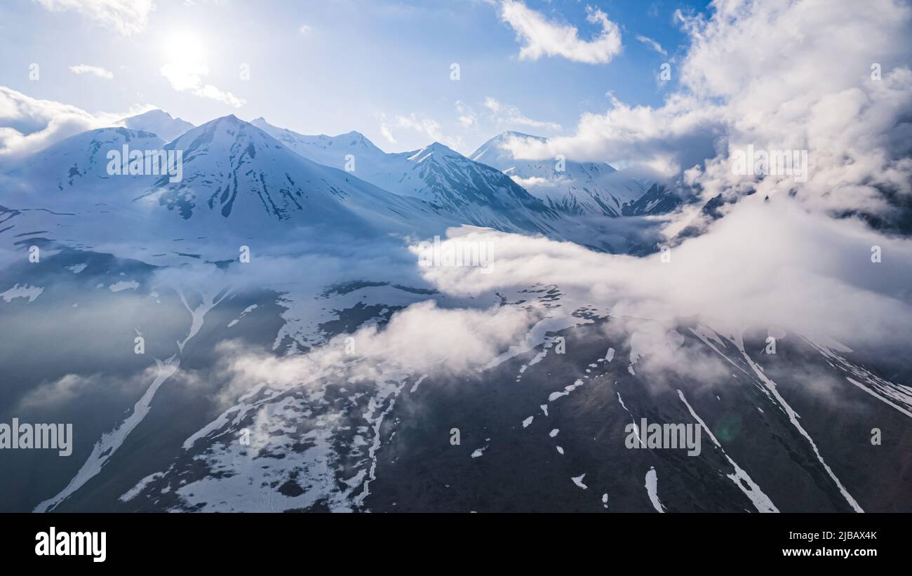high angle view of amazing mountains covered with snow, aerial shot. High quality photo Stock Photo