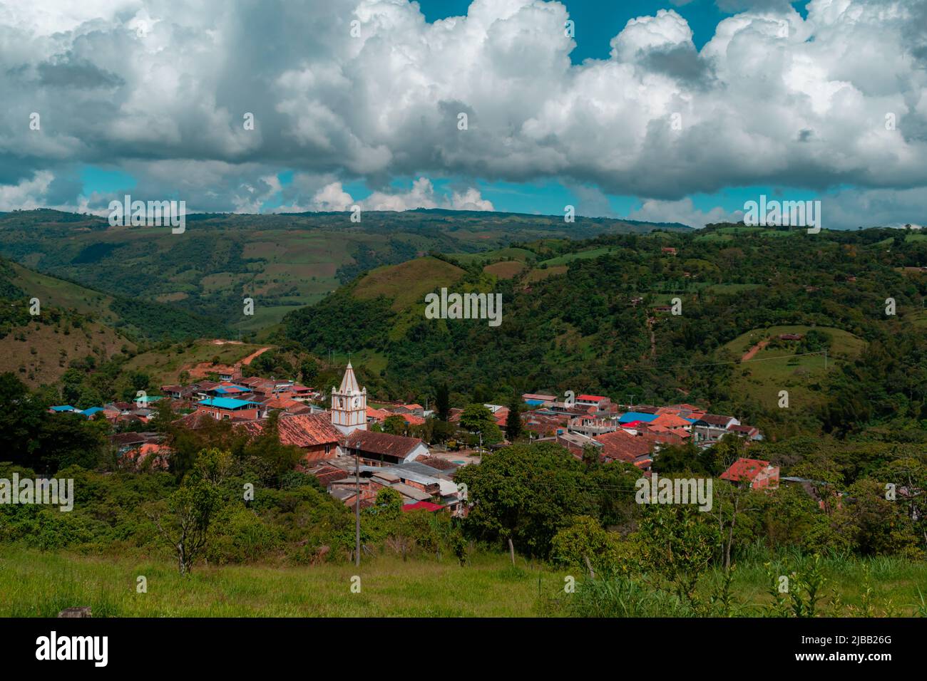 landscape of the municipality of ocamonte in colombia with a view of the church tower and mountains in the background Stock Photo