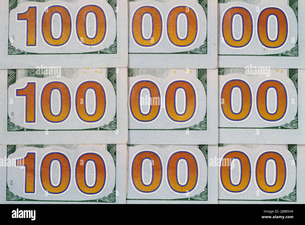 A studio shot concept of an arrangment of the reverse of some United State of America one hundred dollar bills used to spell out one million dollars. Stock Photo