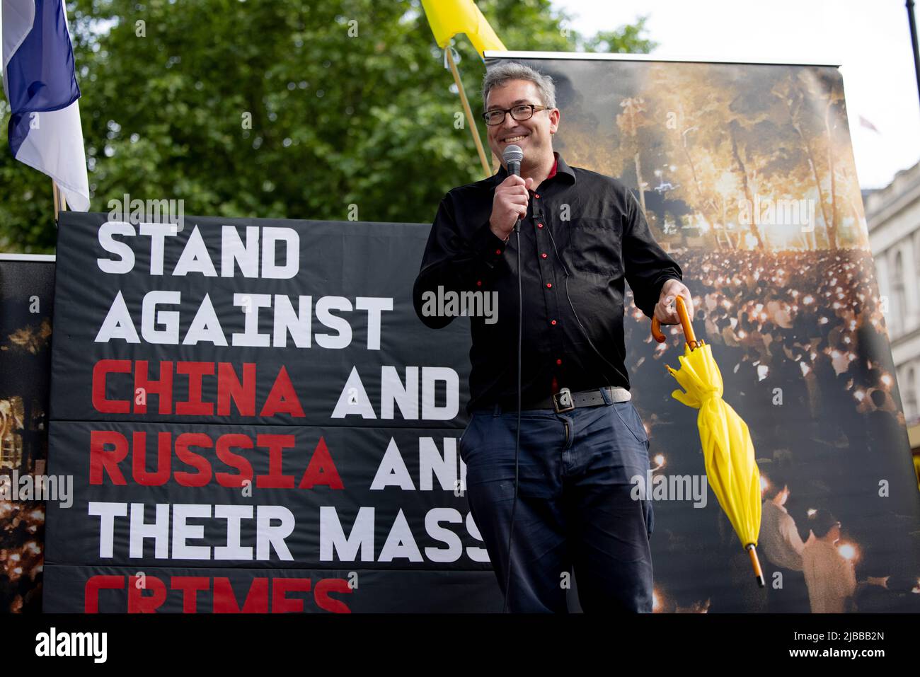London, UK. 04th June, 2022. Benedict Rogers, British human rights activist and the founder of Hong Kong Watch, seen making speeches during the rally outside Downing Street. Hongkongers joint force with the Ukrainians in London to hold a rally at Downing Street to stand against authoritarian regime from country such as China and Russia. Credit: SOPA Images Limited/Alamy Live News Stock Photo