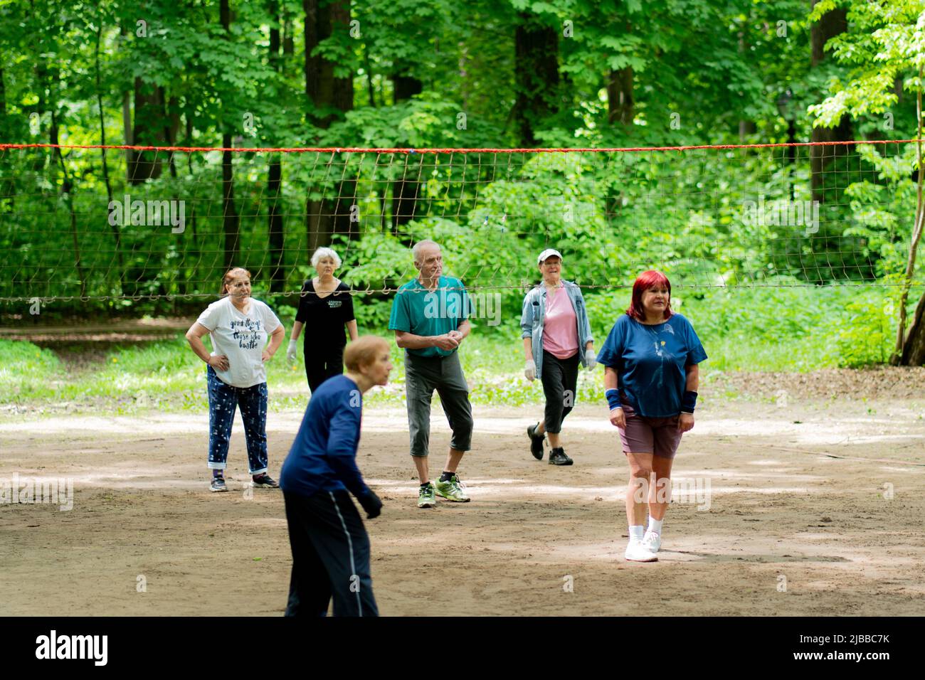 RUSSIA, MOSCOW - june 04, 2022: Sport volleyball forest people old person game lifestyle ball male, from playing years for happy and ethnic portrait Stock Photo