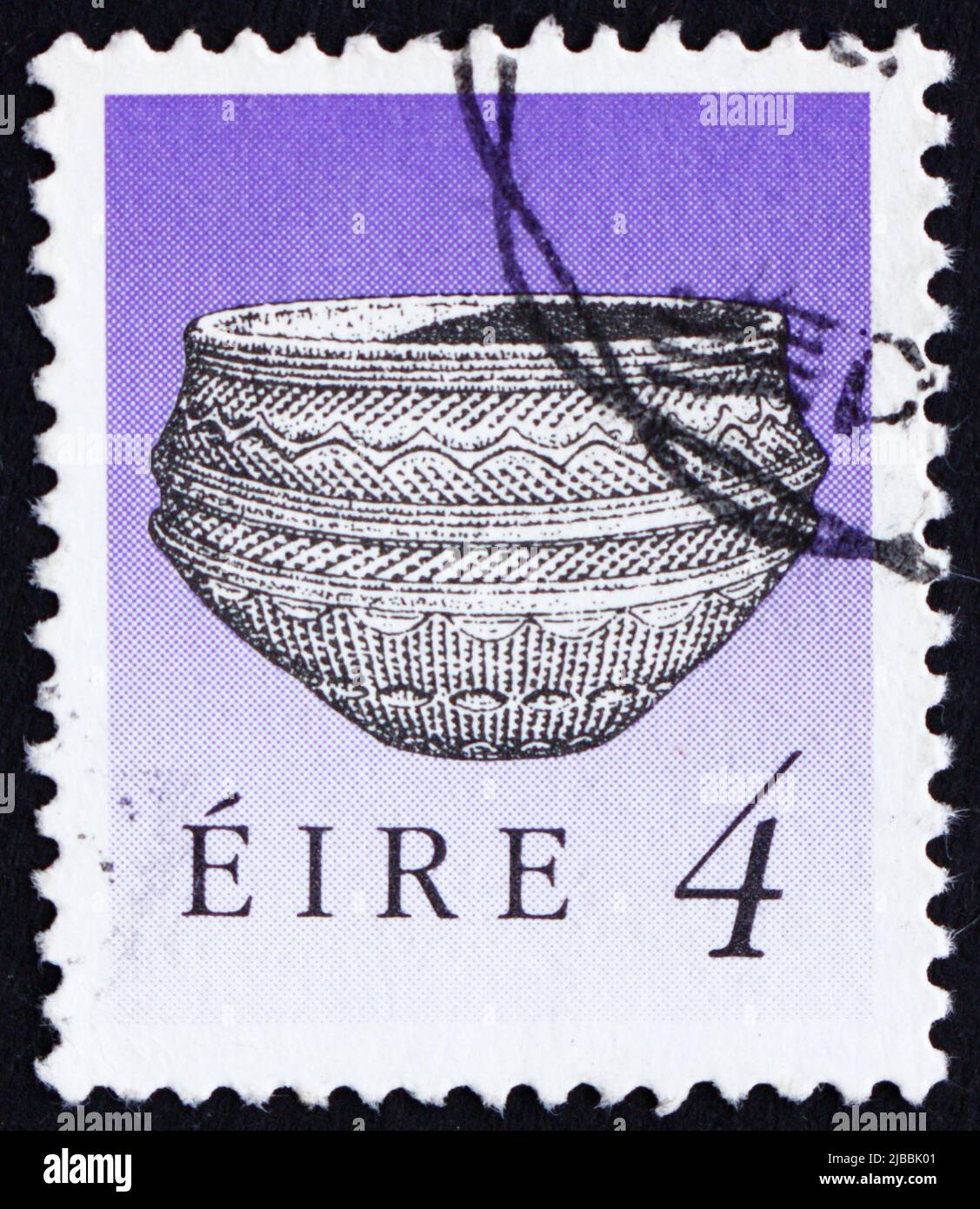 IRELAND - CIRCA 1990: a stamp printed in the Ireland shows Dunamase Food Vessel, Art Treasure of Ireland, circa 1990 Stock Photo