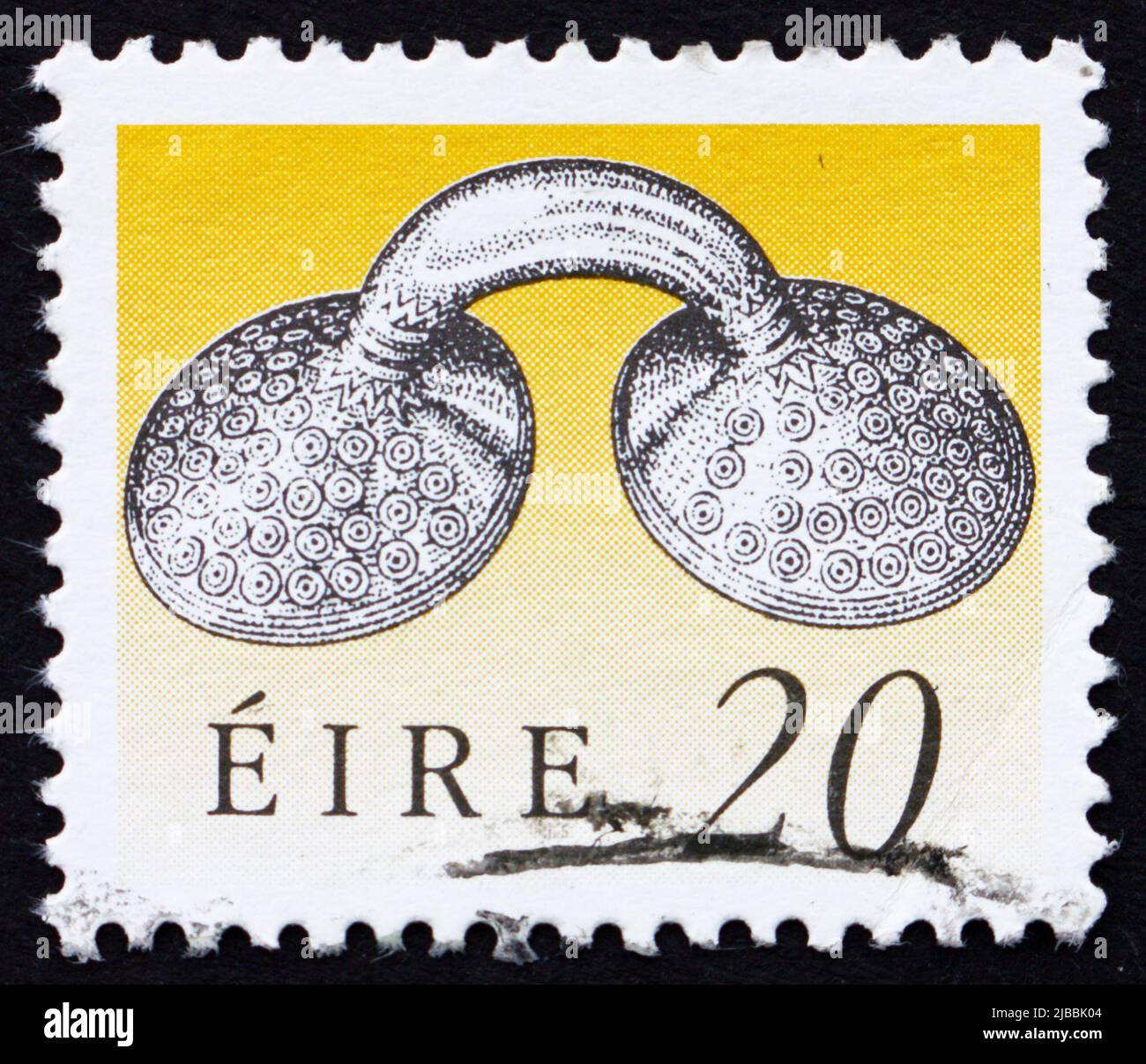 IRELAND - CIRCA 1991: a stamp printed in the Ireland shows Gold Dress Fastener, Art Treasure of Ireland, circa 1991 Stock Photo