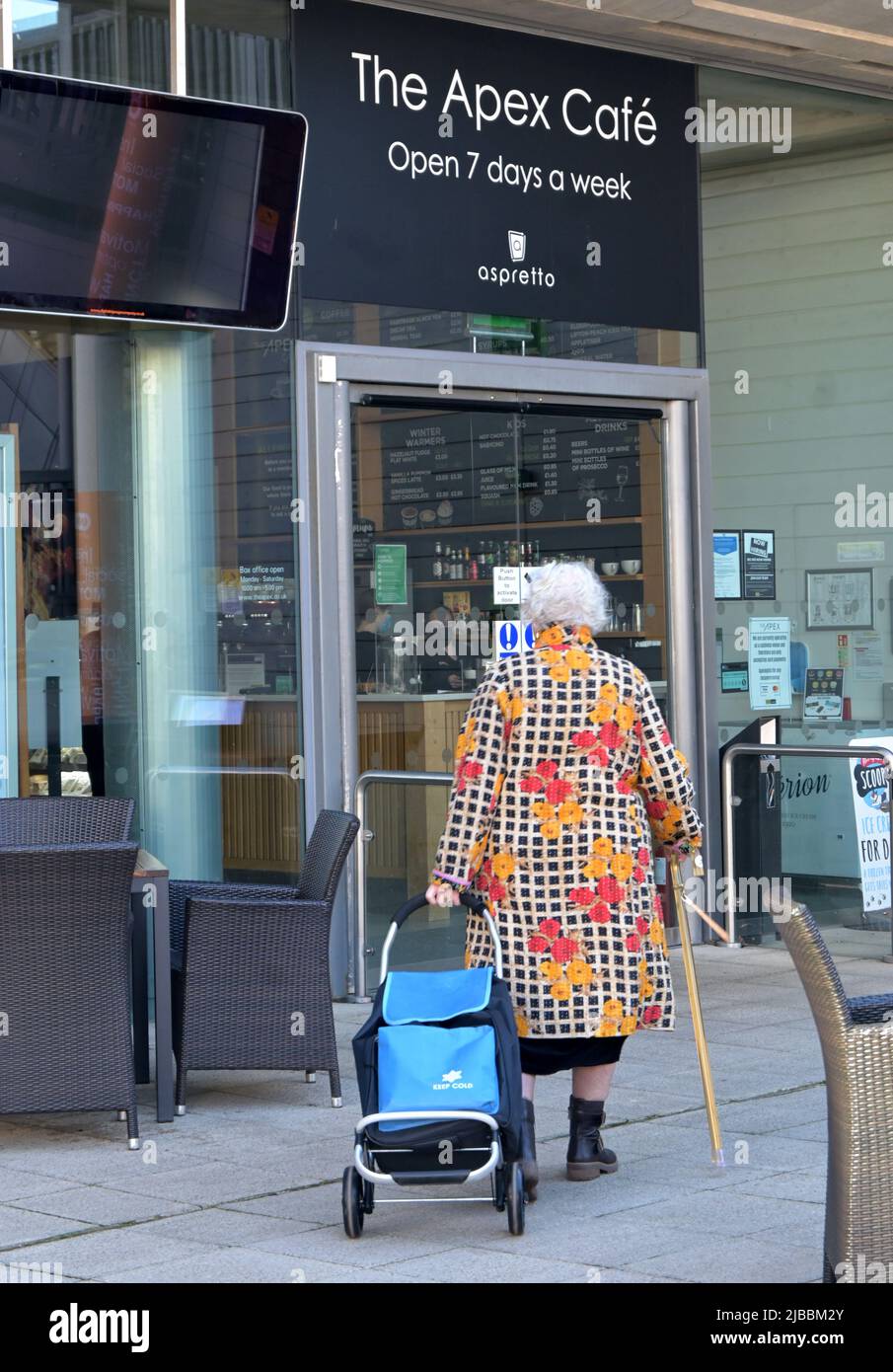 older woman with walking stick Stock Photo Alamy