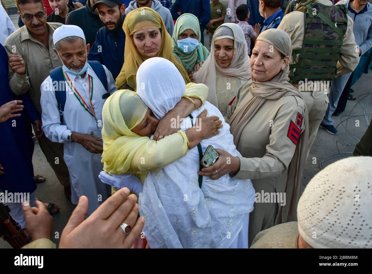 Srinagar, Kashmir. 05th June, 2022. A woman gives a farewell hug to her ...