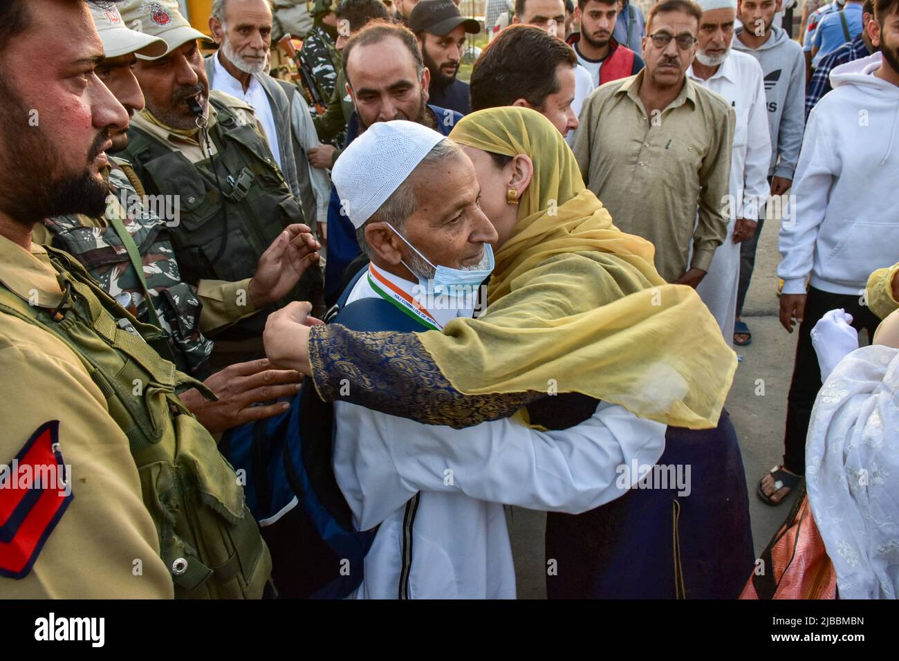 Srinagar, India. 05th June, 2022. A woman gives a farewell hug to her ...