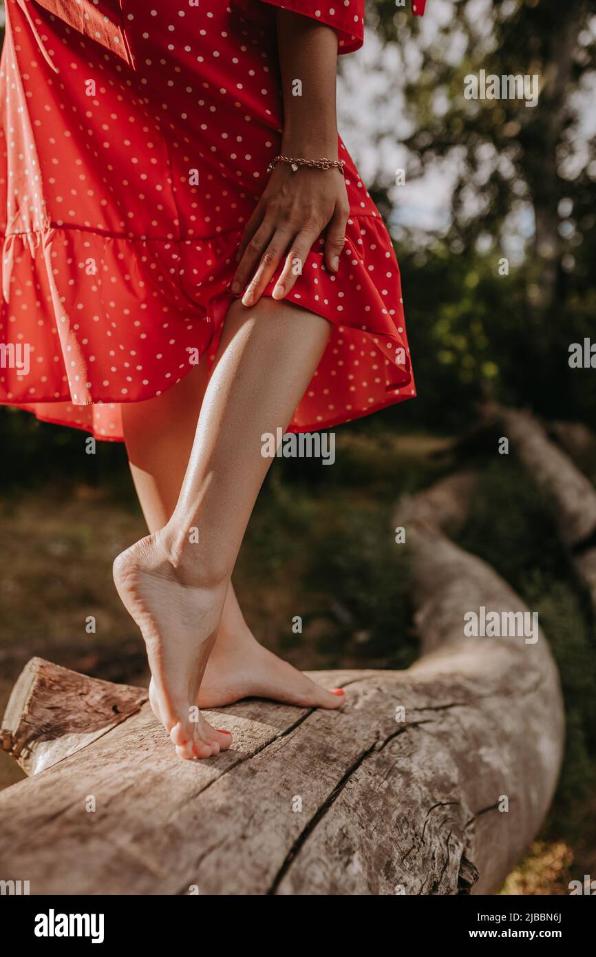 Woman showing her legs hi-res stock photography and images - Alamy