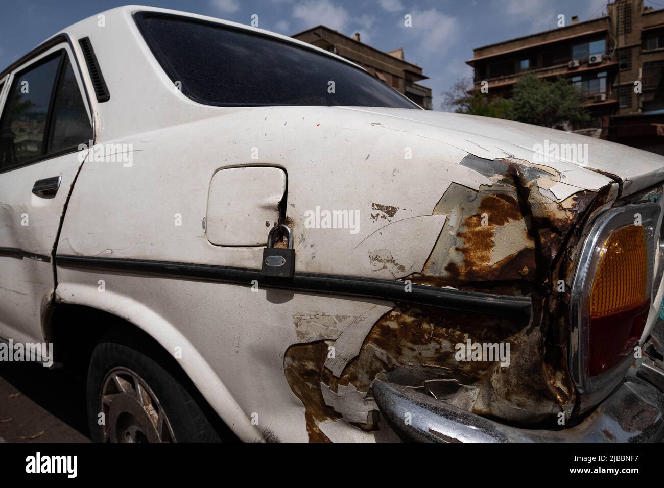 fuel tank closeup locked with padlock Stock Photo