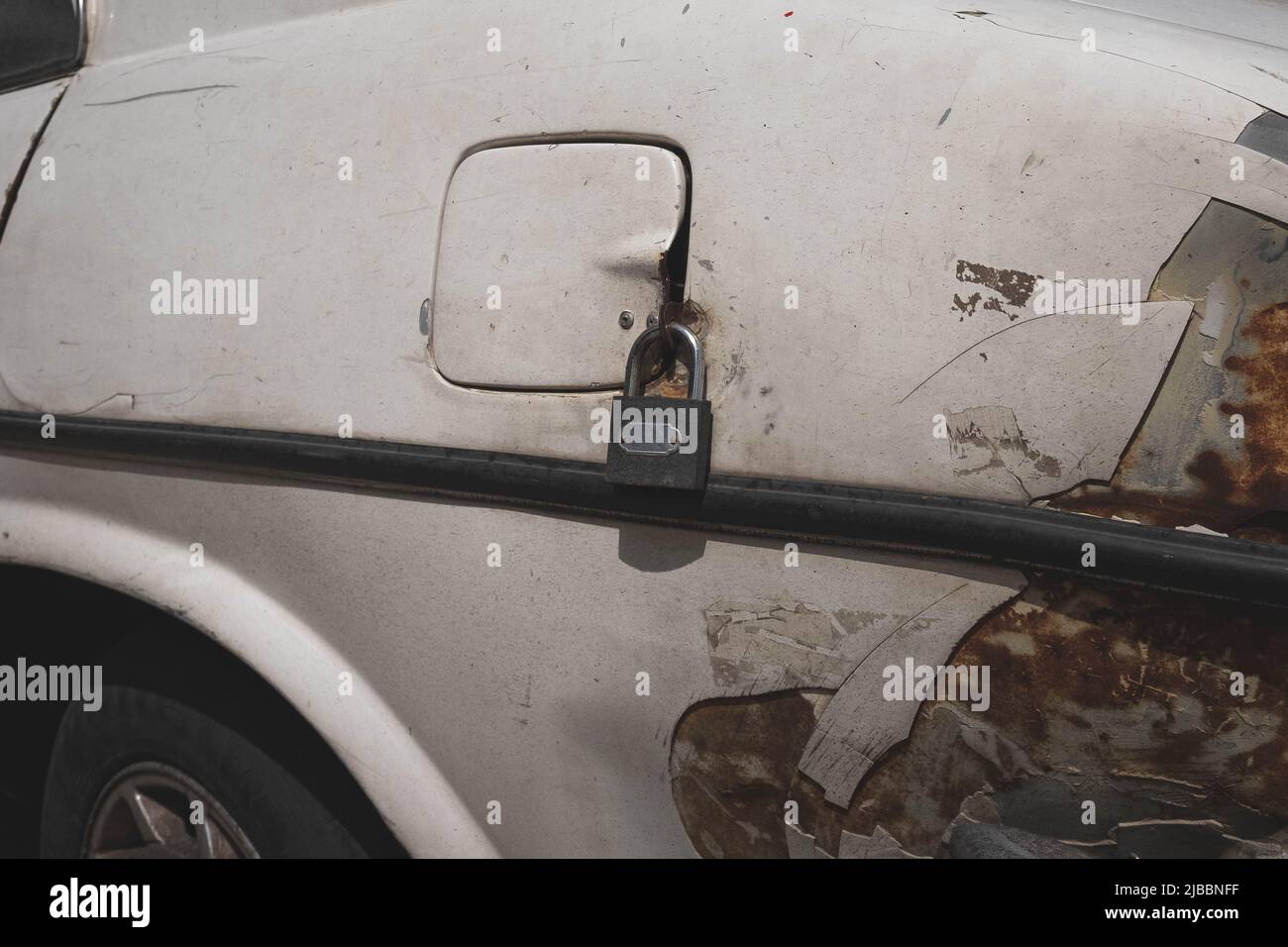 fuel tank closeup locked with padlock Stock Photo